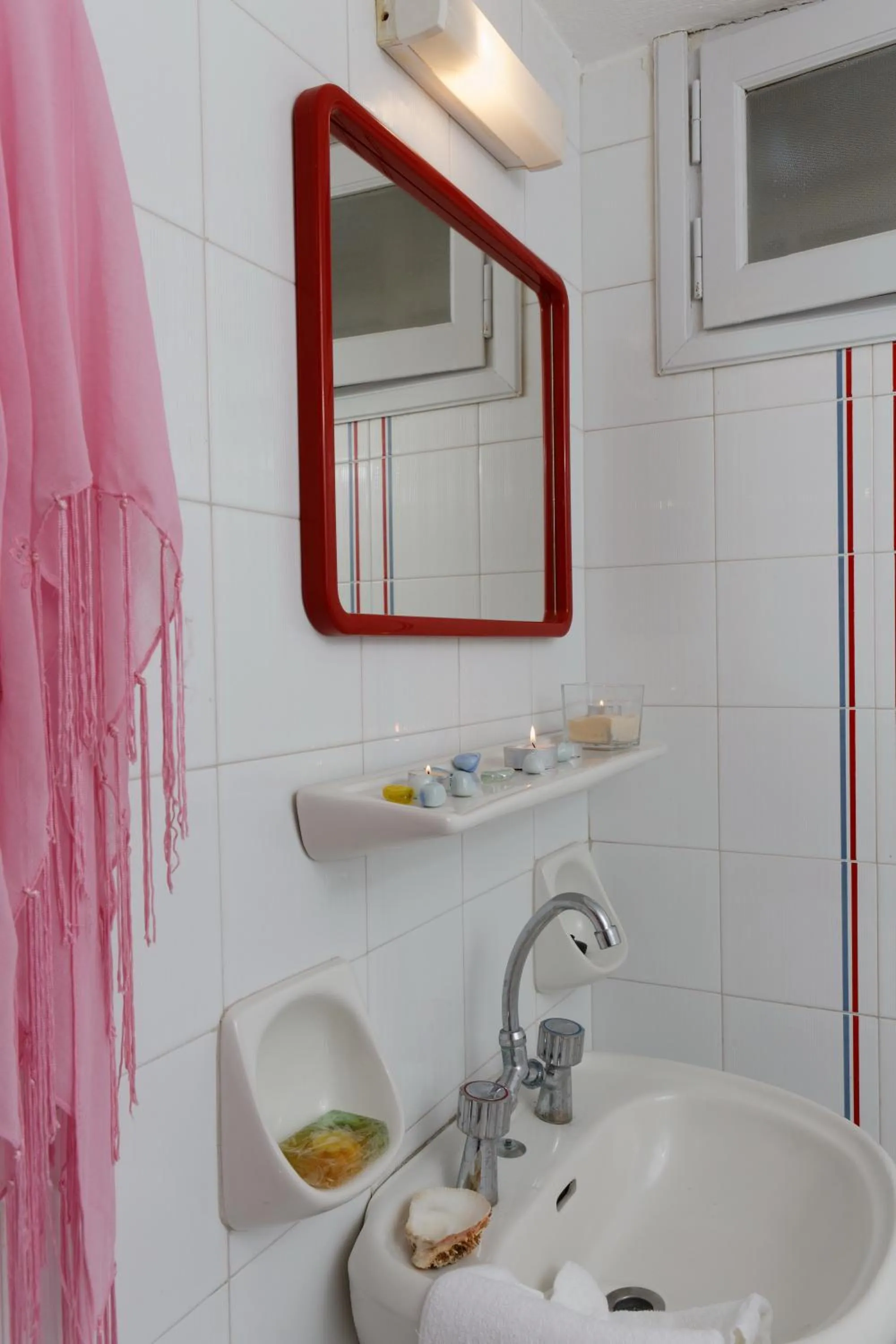 Bathroom in Remi Apartments