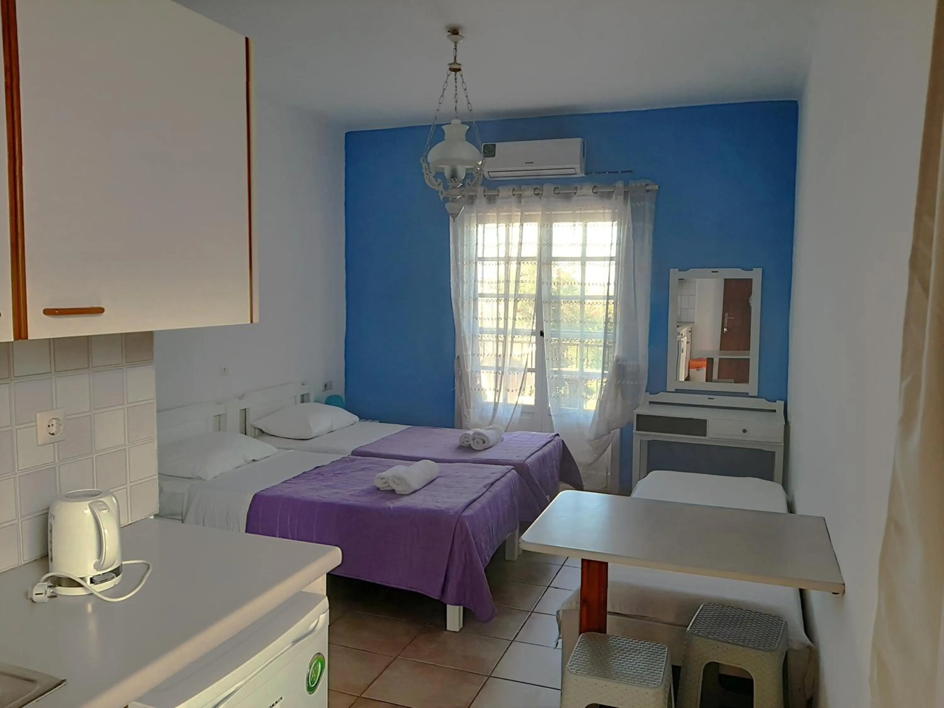 Kitchen or kitchenette in Remi Apartments