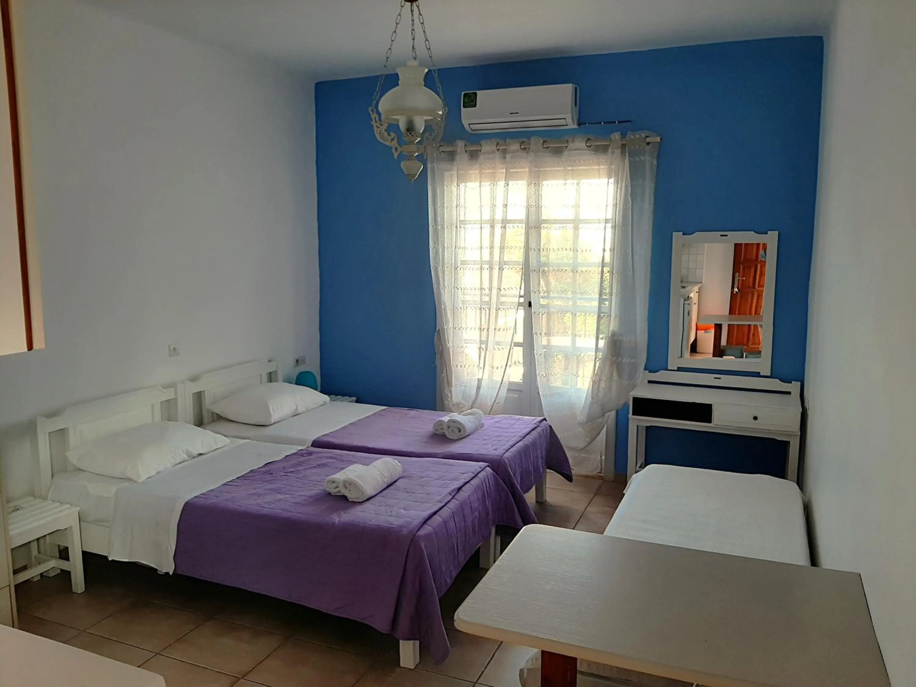 Bedroom in Remi Apartments