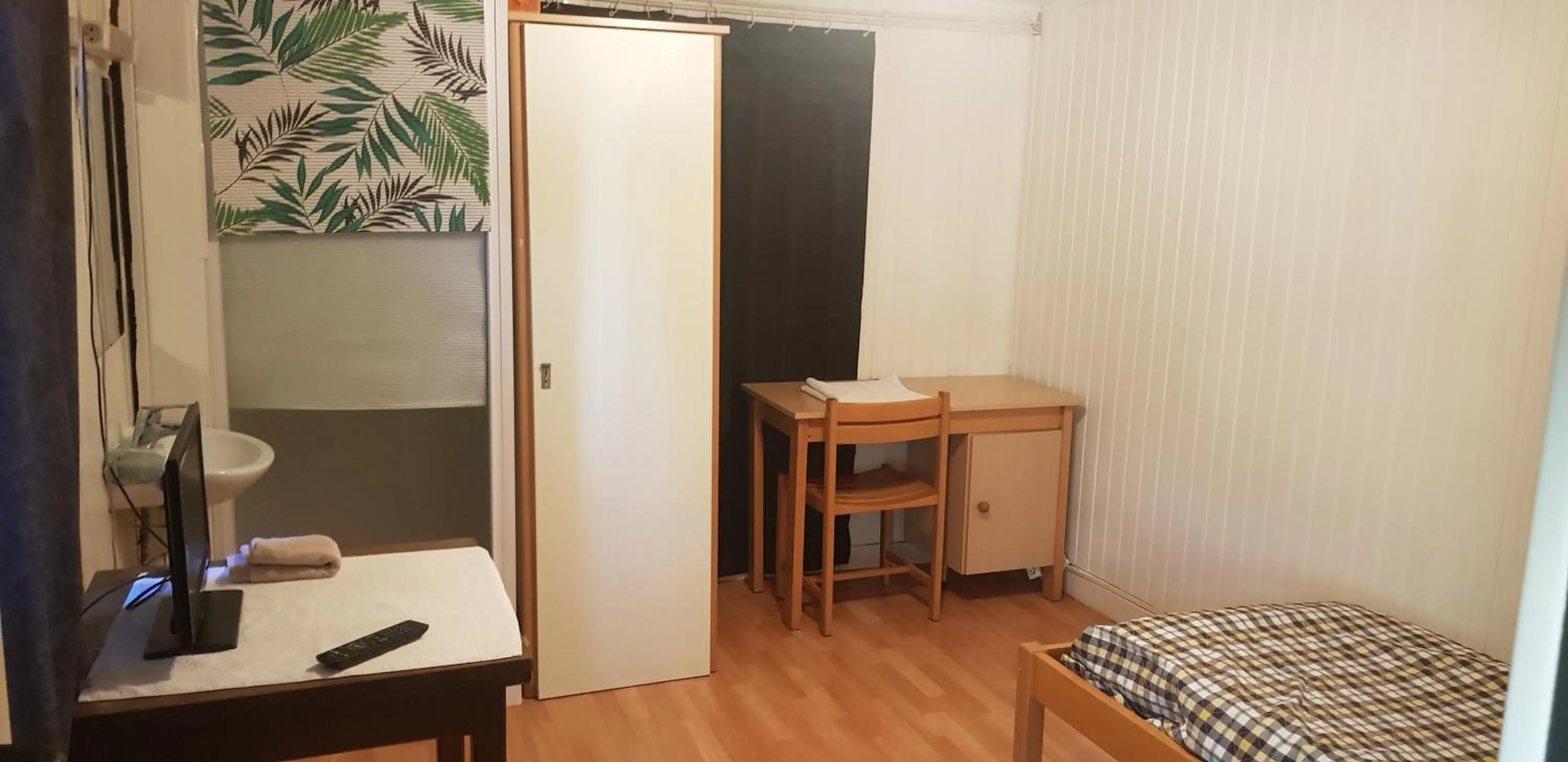 TV/Entertainment Center in Hotel Le Tram