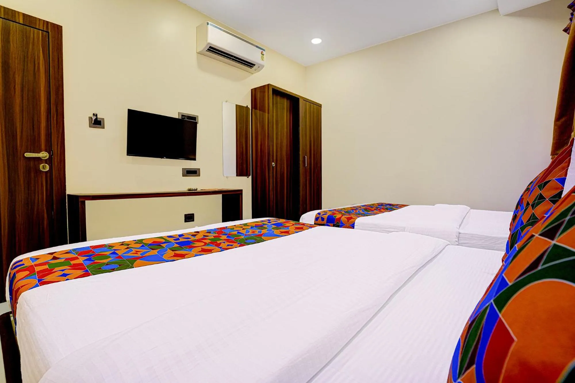 Bed in FabHotel Majestic Crest