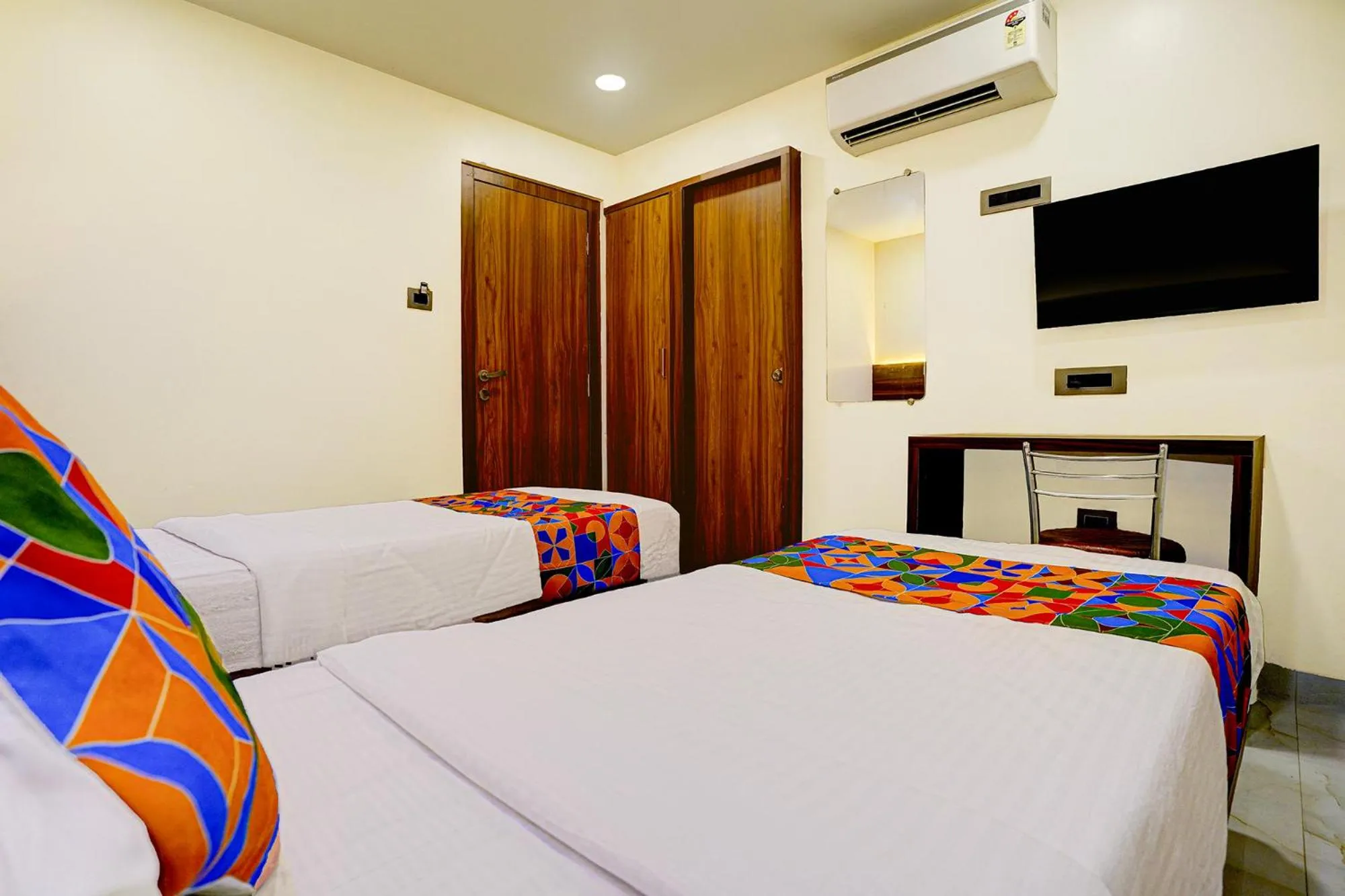 Bed in FabHotel Majestic Crest