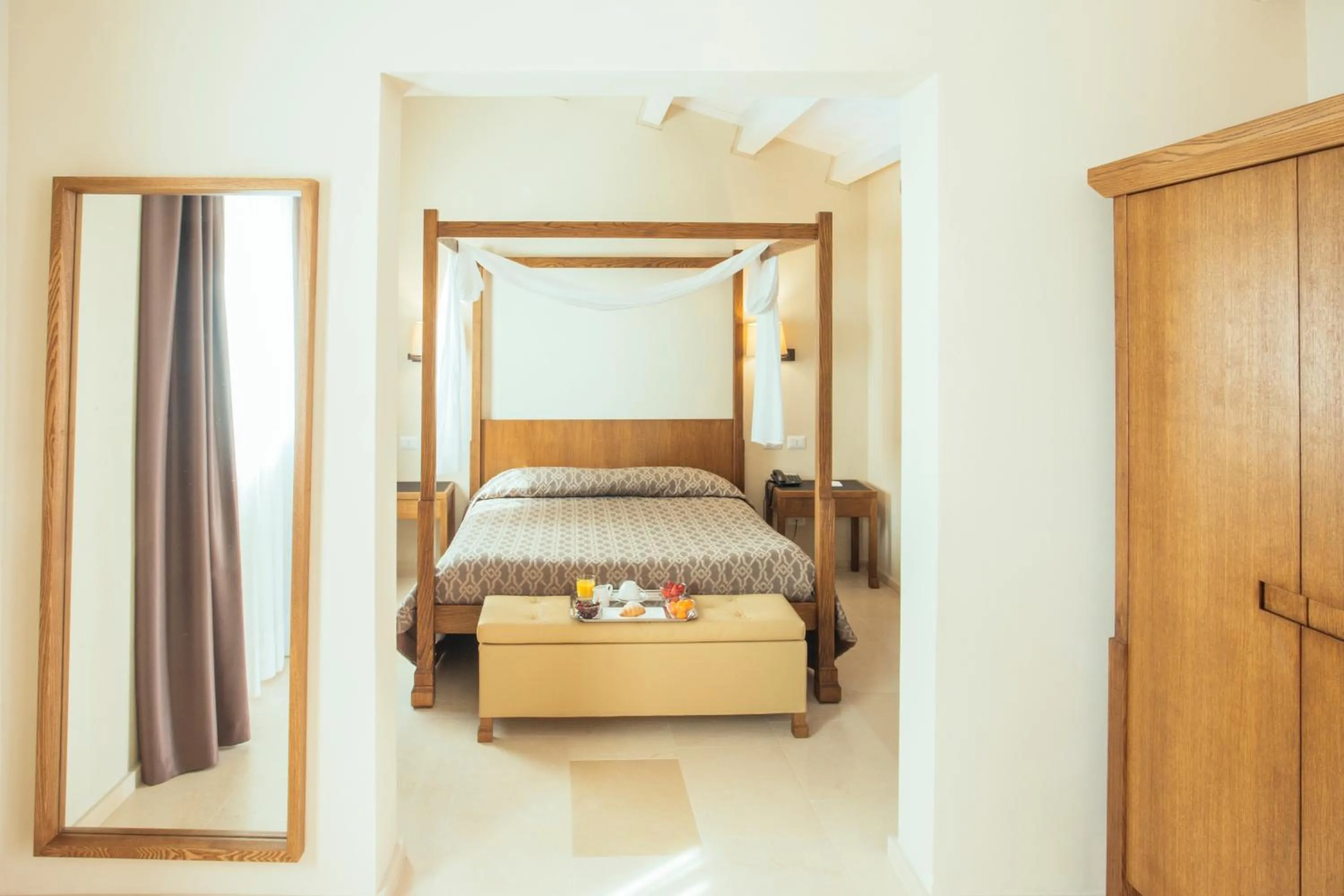 Photo of the whole room, Bed in Firriato Hospitality - Baglio Sorìa