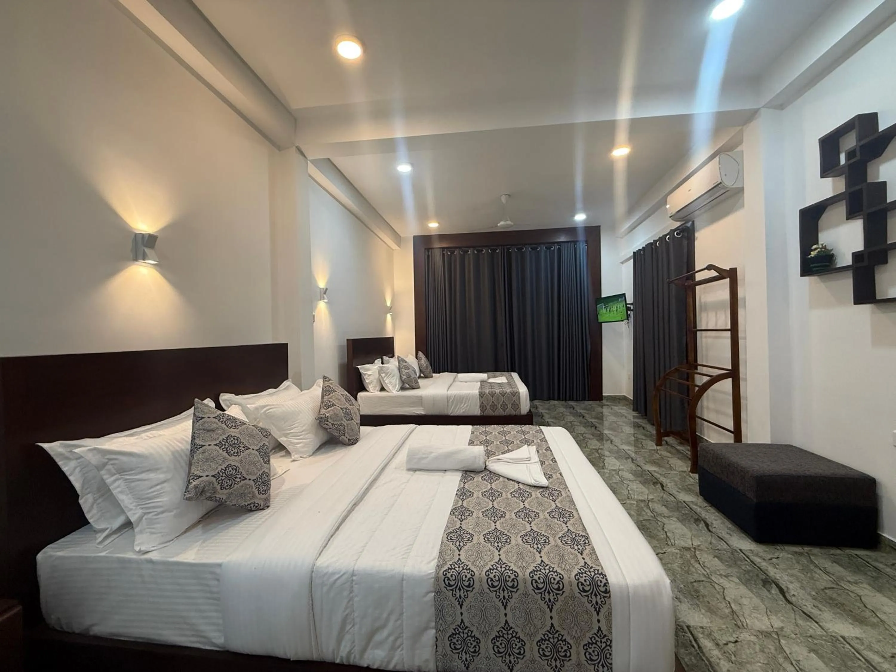 Bed in Aloe Transit Hotel