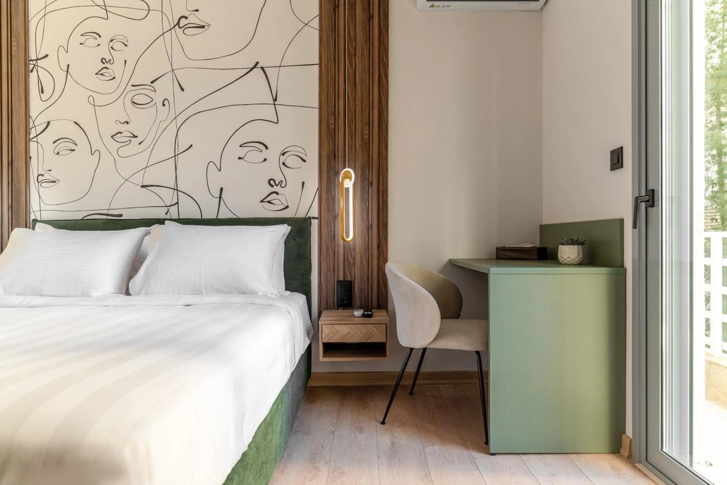 Bed in Phalerus Suites