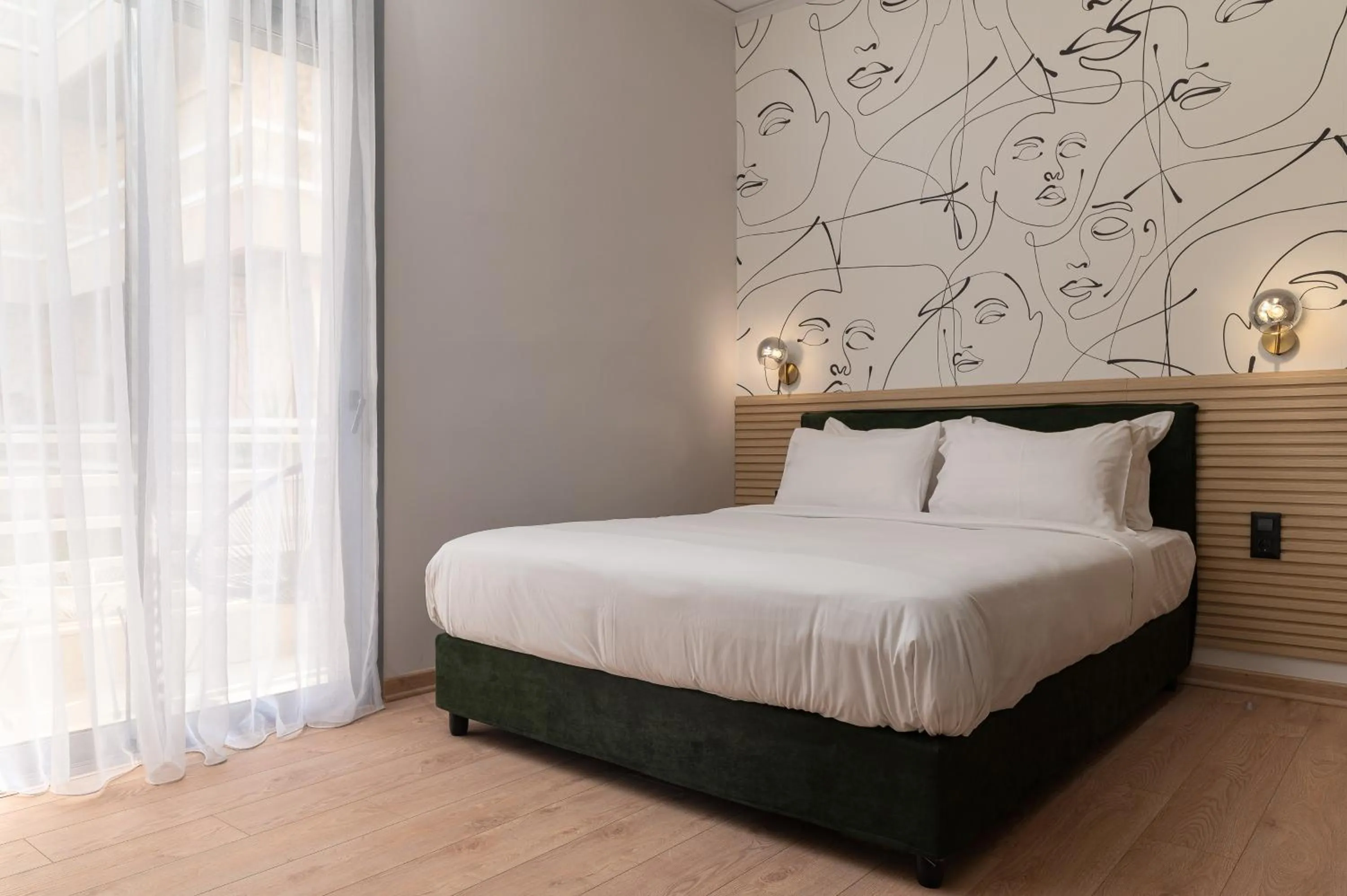 Bed in Phalerus Suites