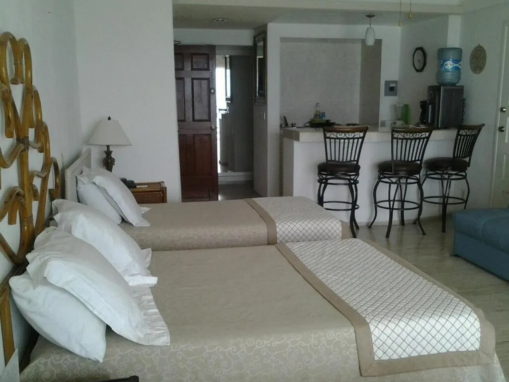 Photo of the whole room, Bed in Salvia Condominio