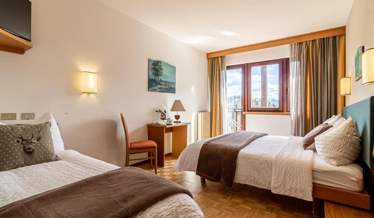 Bed in Hotel Arcobaleno