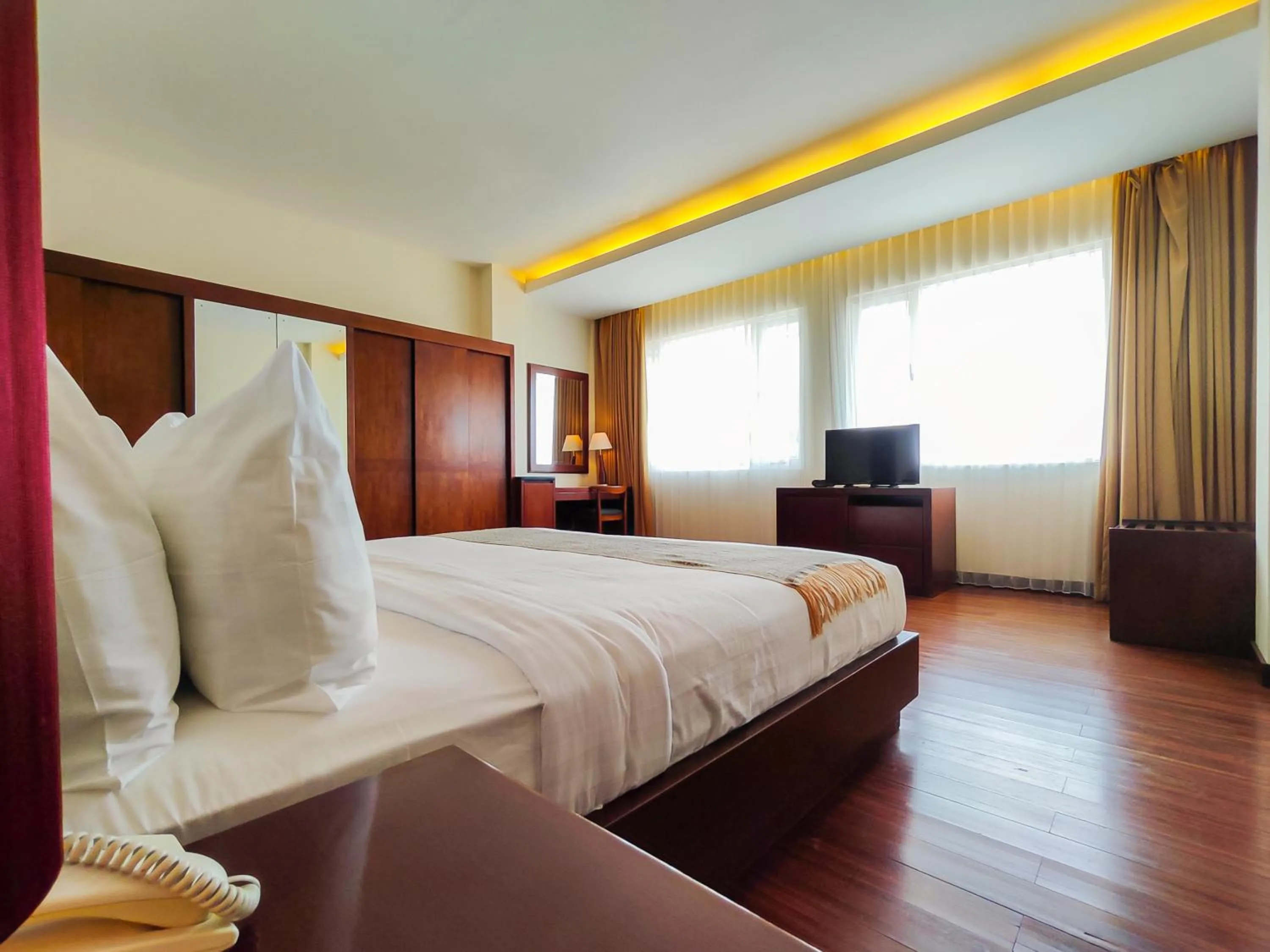 Bed in Seminyak Square Hotel And Villas