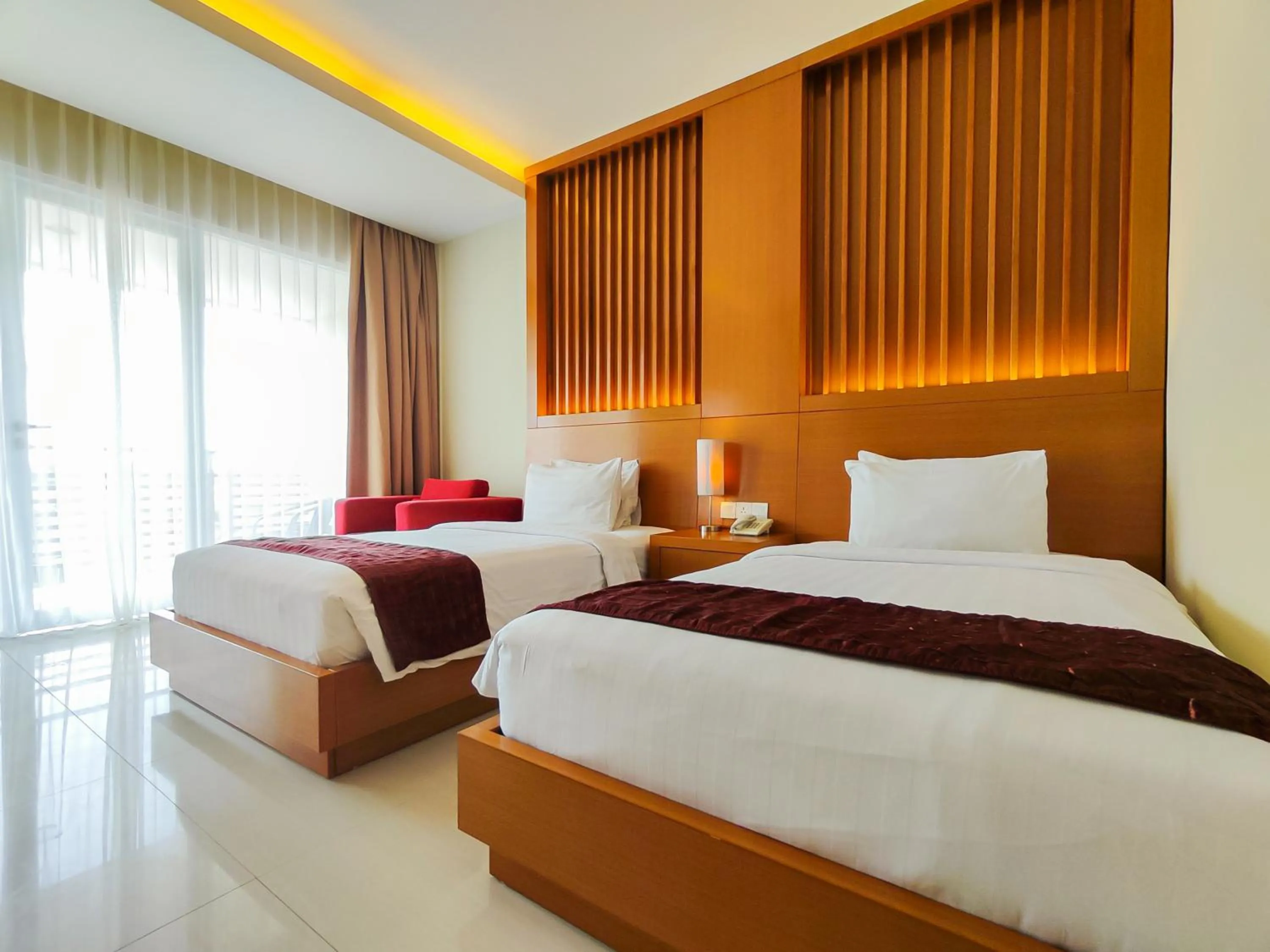 Bed in Seminyak Square Hotel And Villas