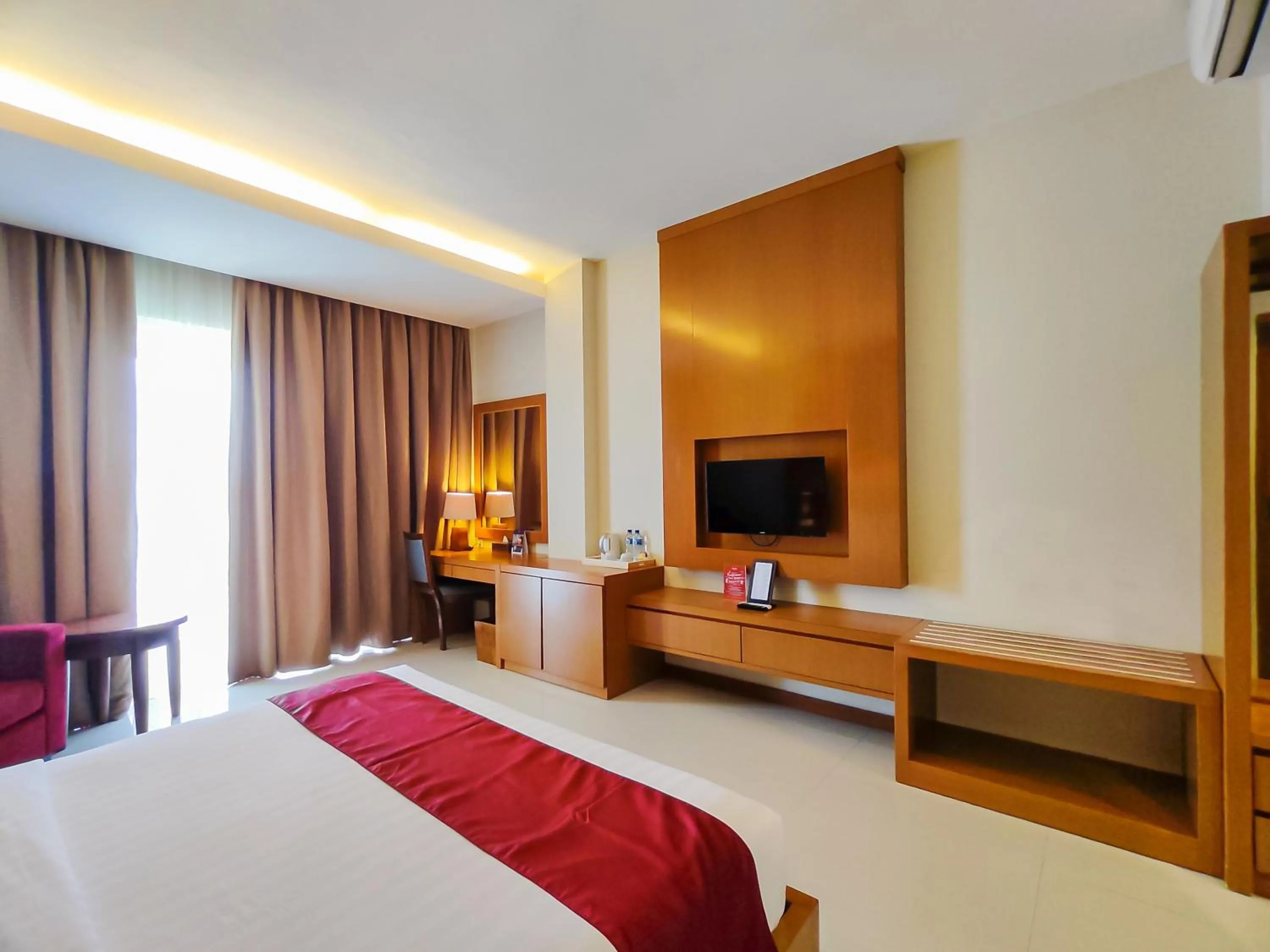 Communal lounge/ TV room, Bed in Seminyak Square Hotel And Villas