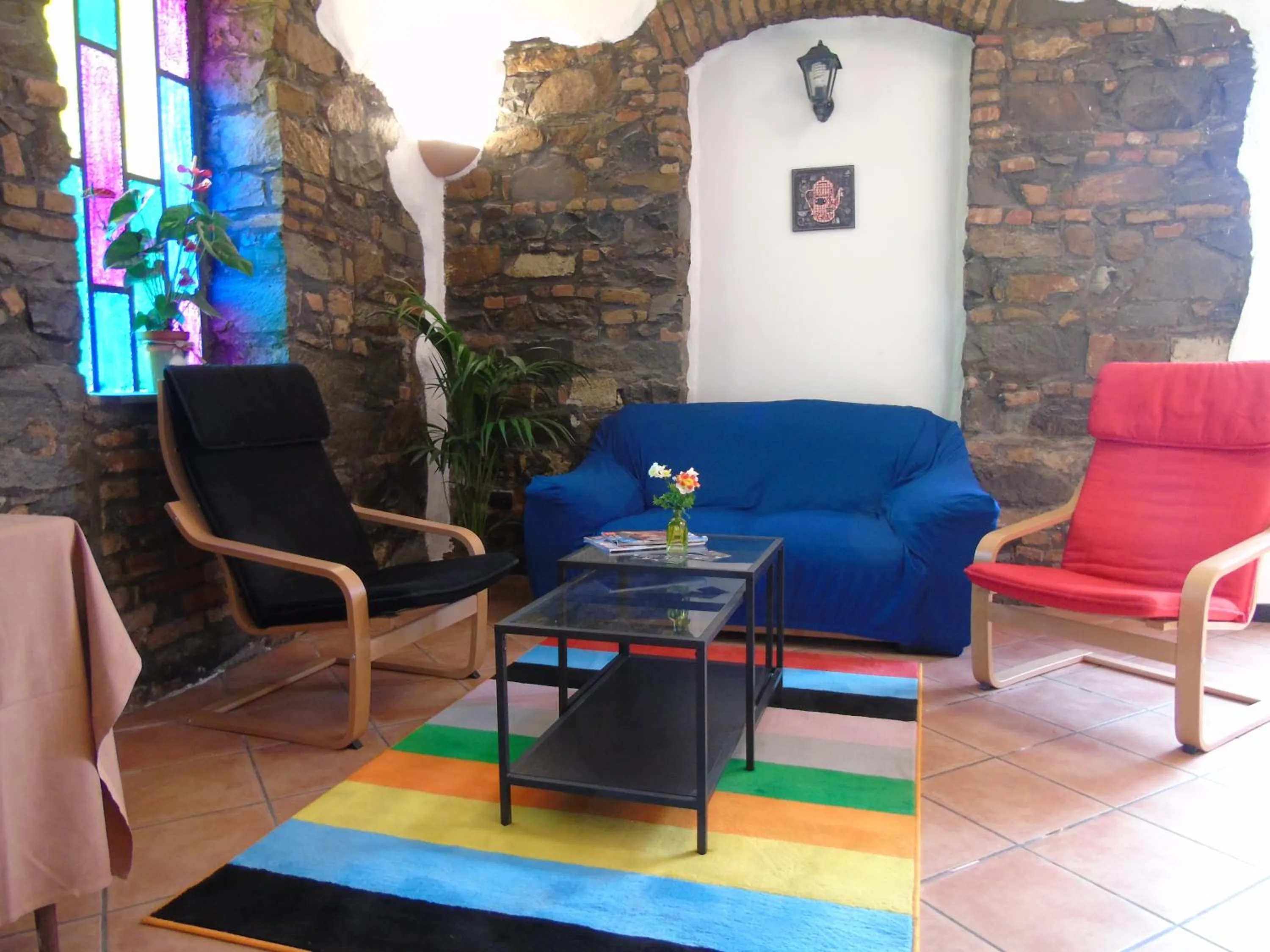 Communal lounge/ TV room in Hotel Rainbow