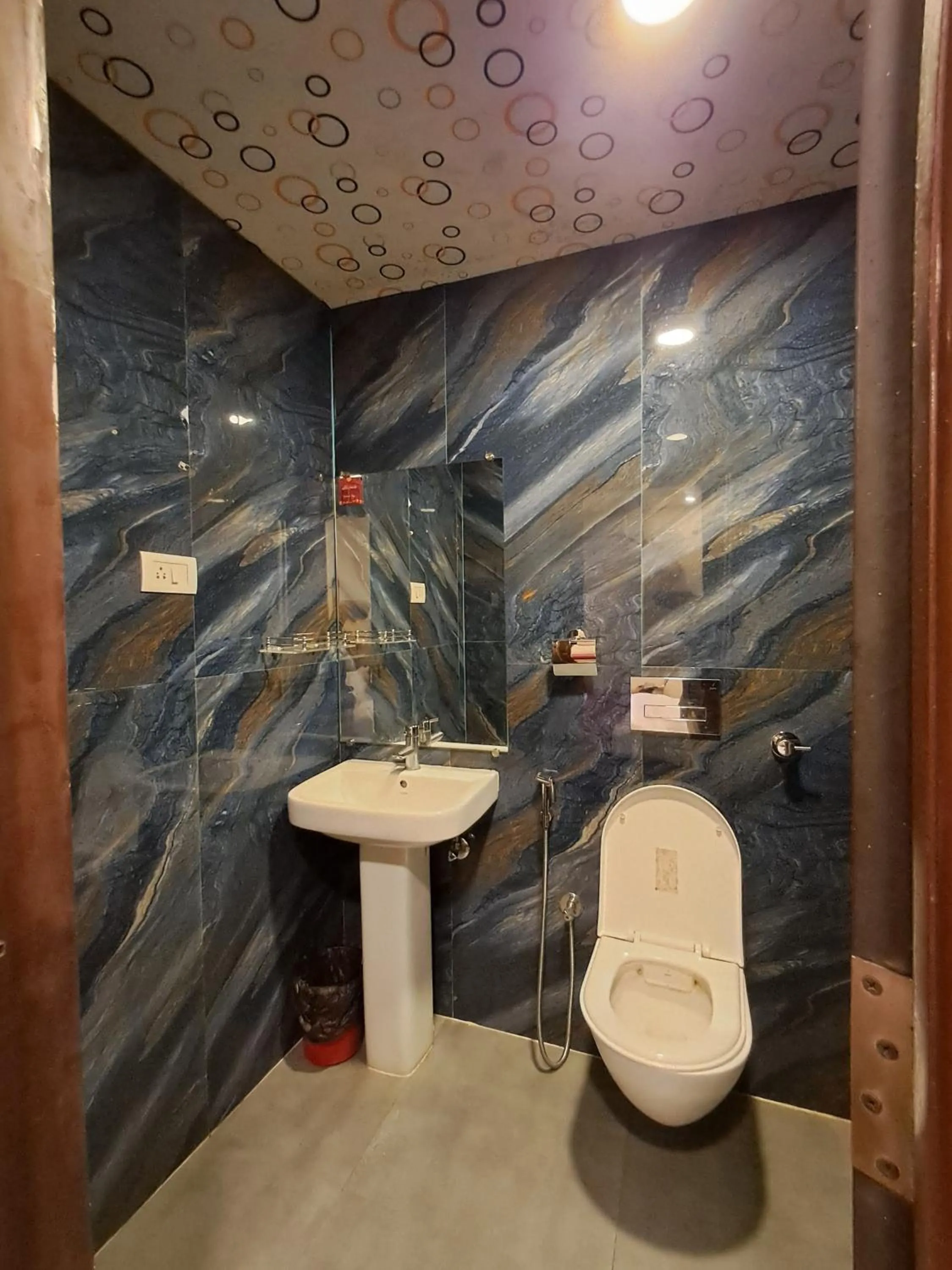 Toilet in ARC The Boutique Hotel