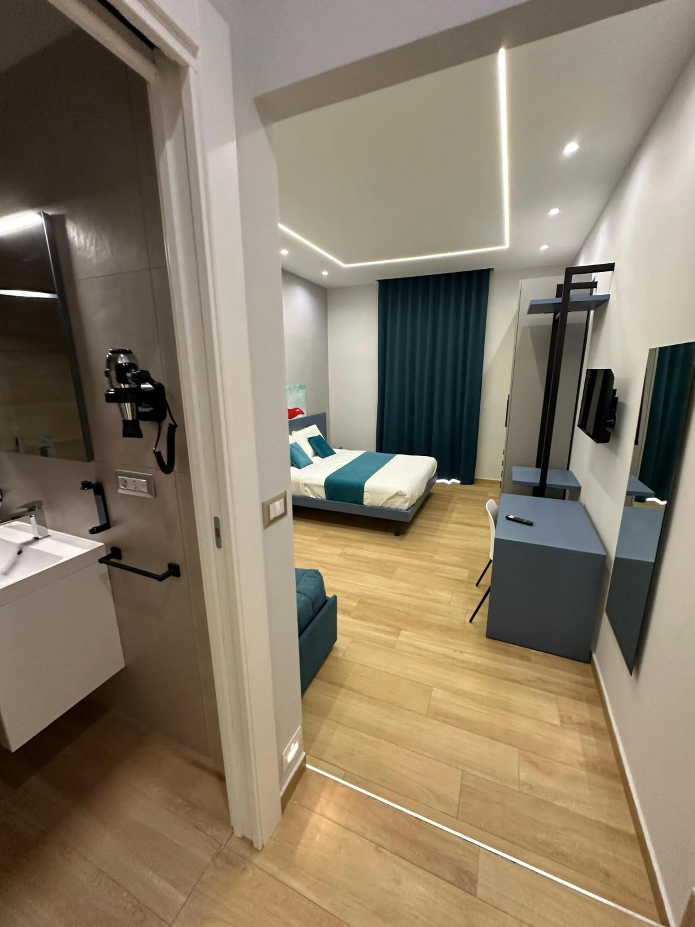 Bed in Hotiday Napoli Astoria