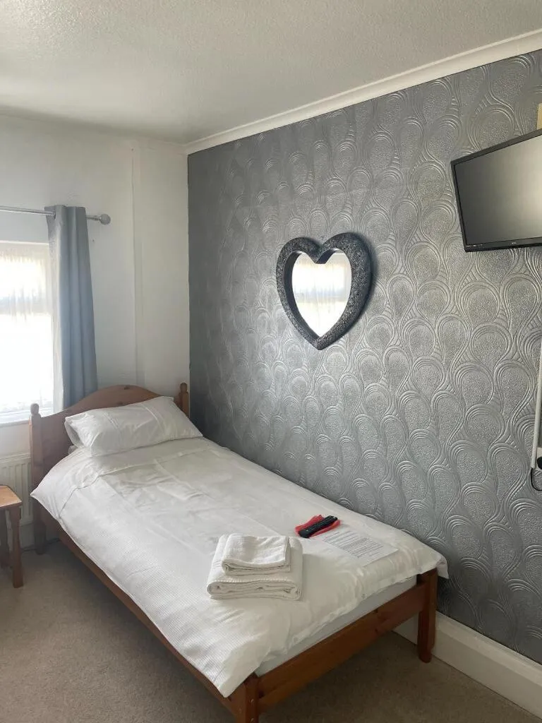 Bed in The Saxby Hotel