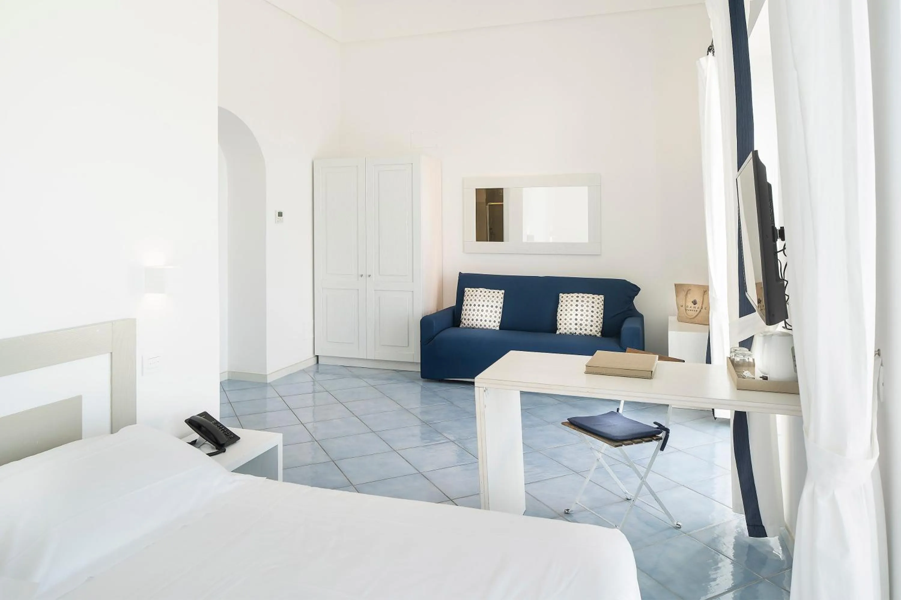 Living room, Bed in Miramare Sea Resort & Spa