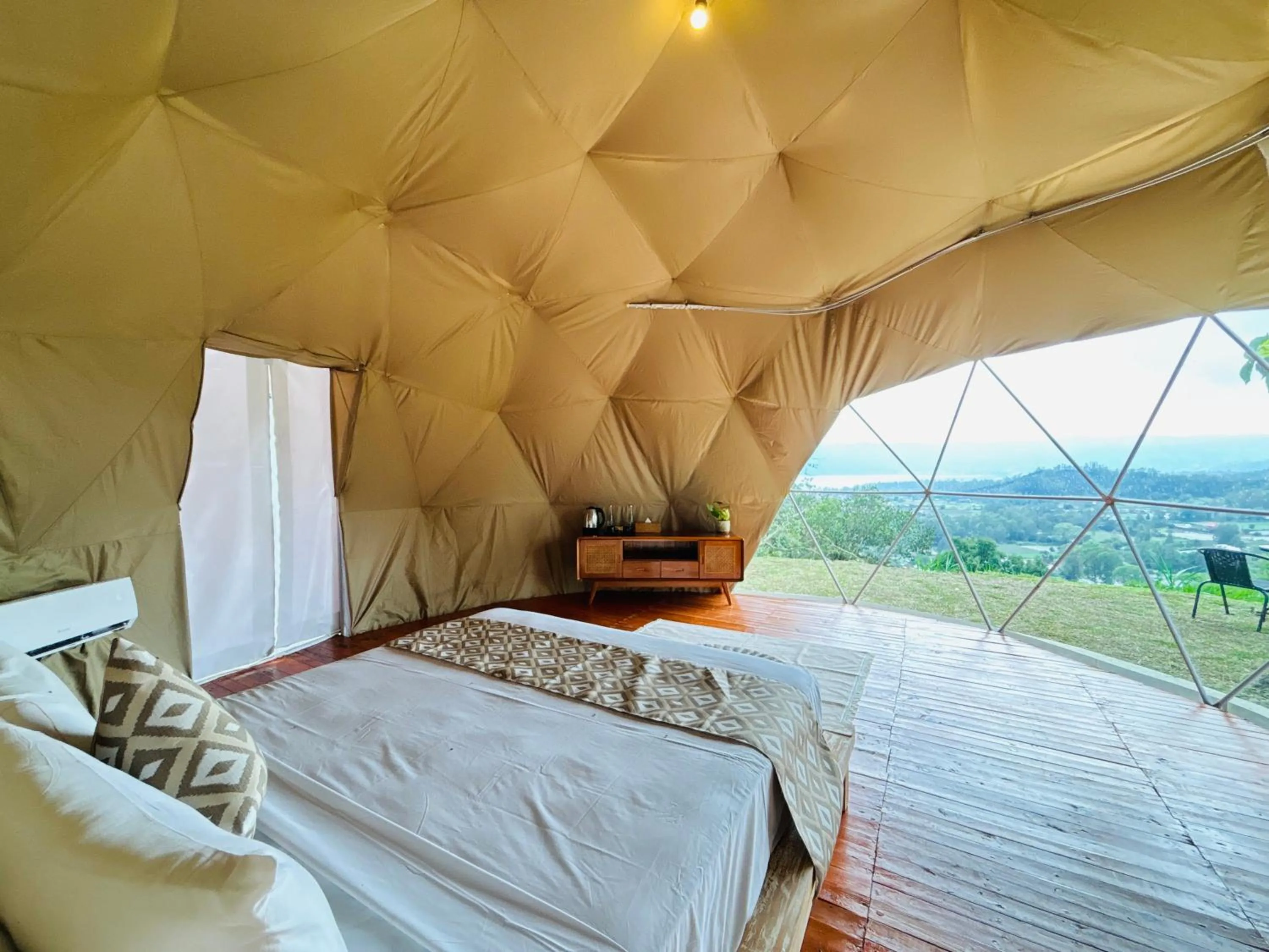 Bed in De'Ra Hills Camp Kintamani