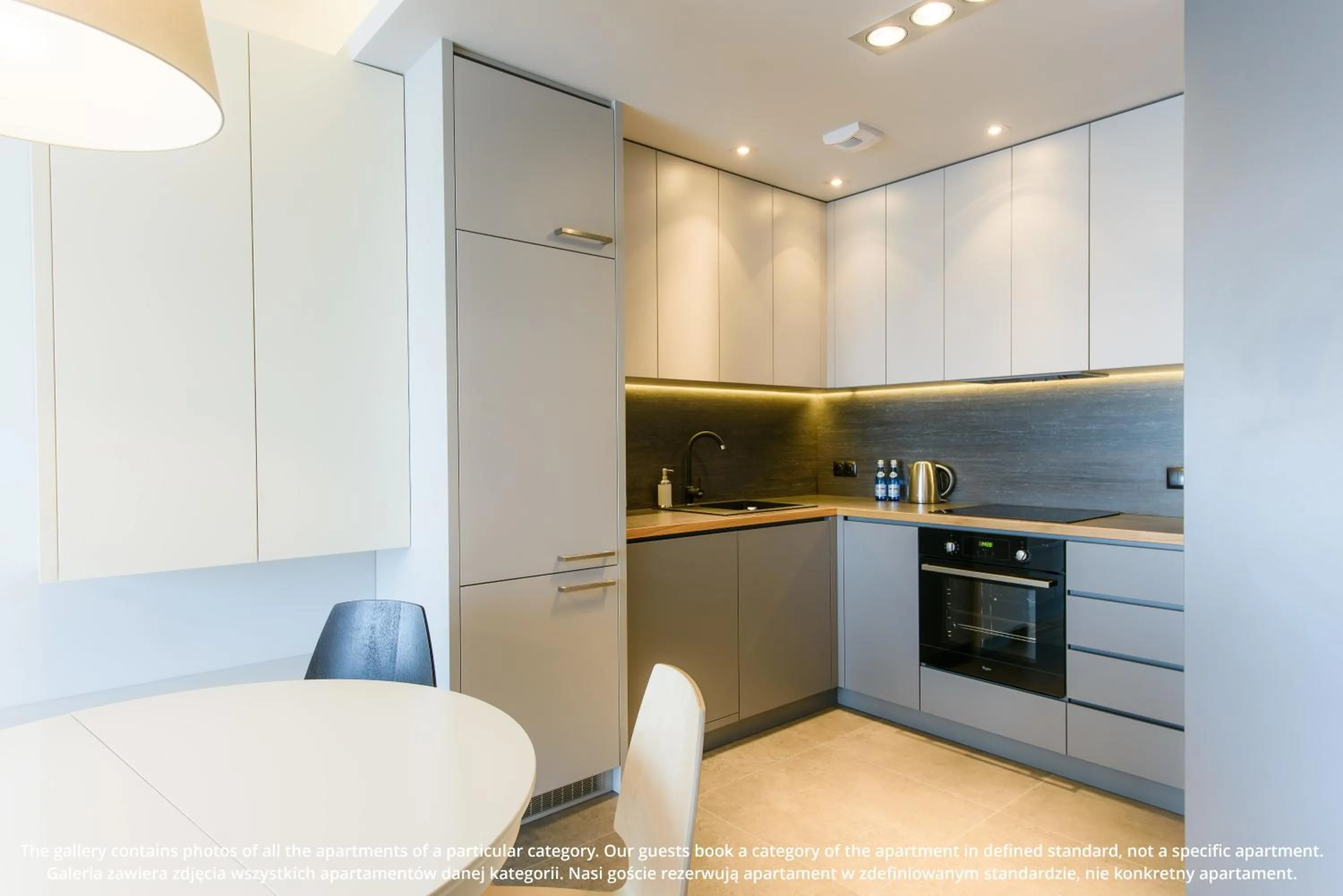 Kitchen or kitchenette in EXCLUSIVE Aparthotel Kraków Browar Lubicz