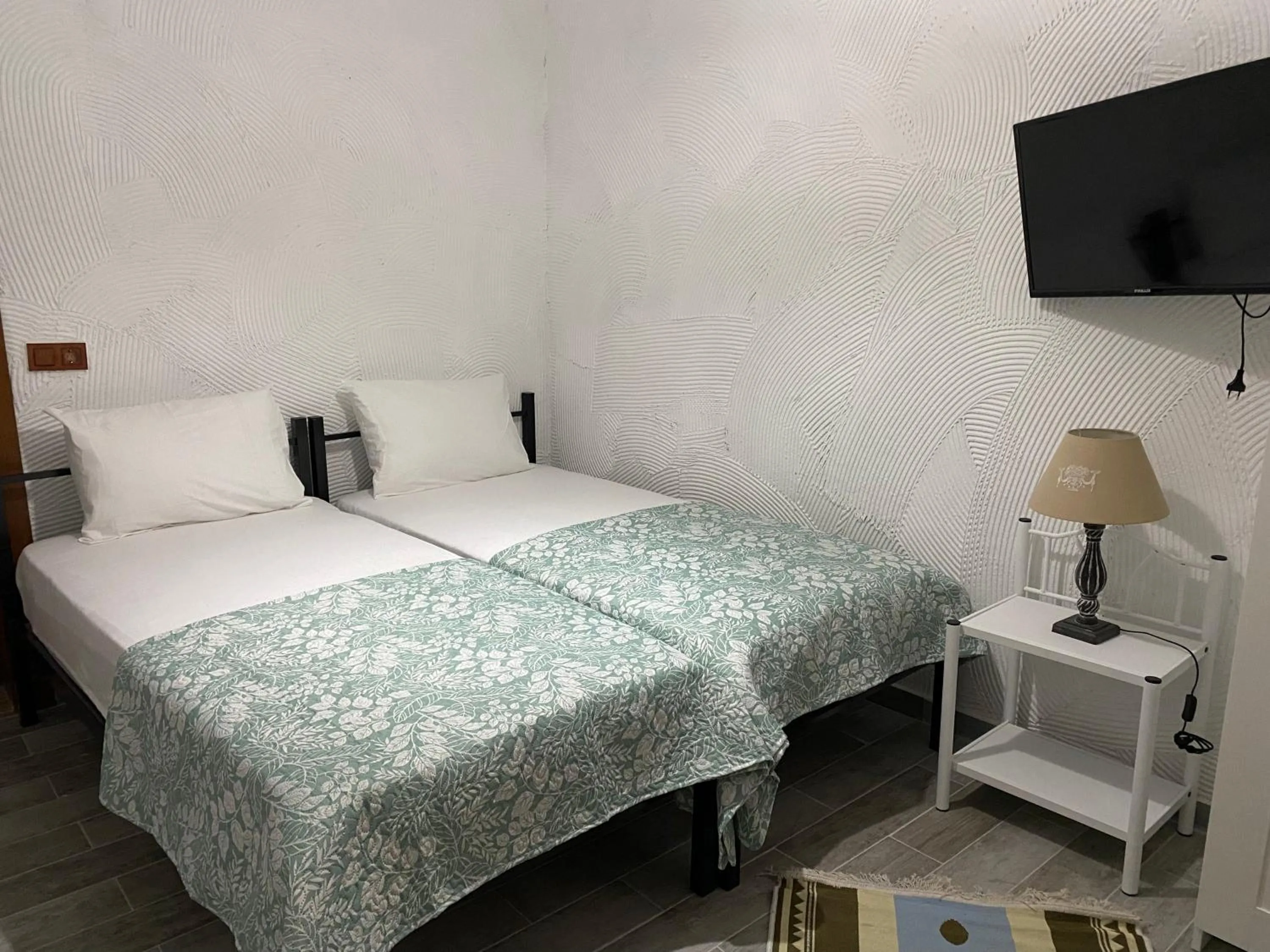 Bed in The Stone Castle Boutique Hotel