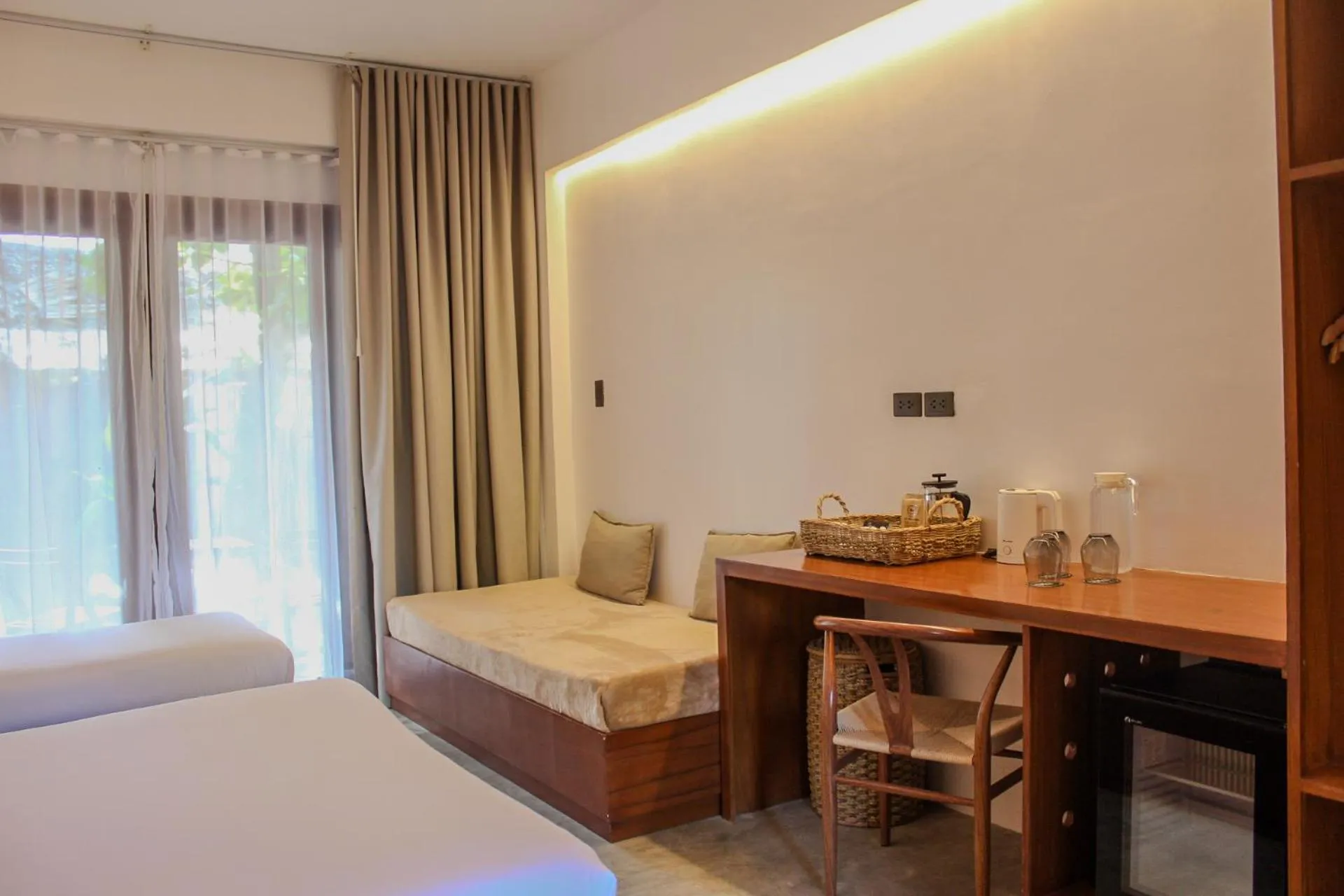 Photo of the whole room, Bed in The Henry Resort Siargao at Kermit