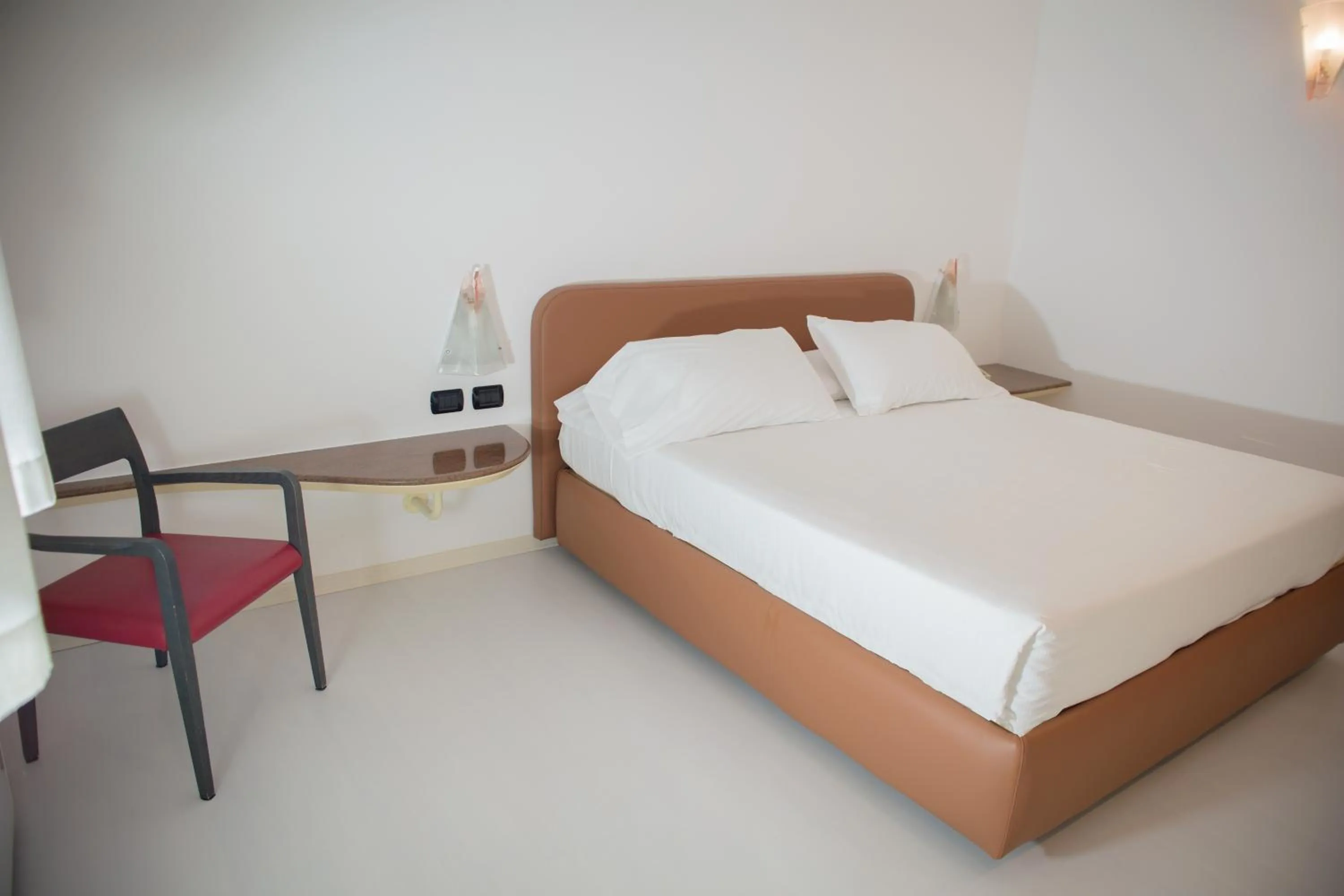 Bed in Blue Relais Maggiore