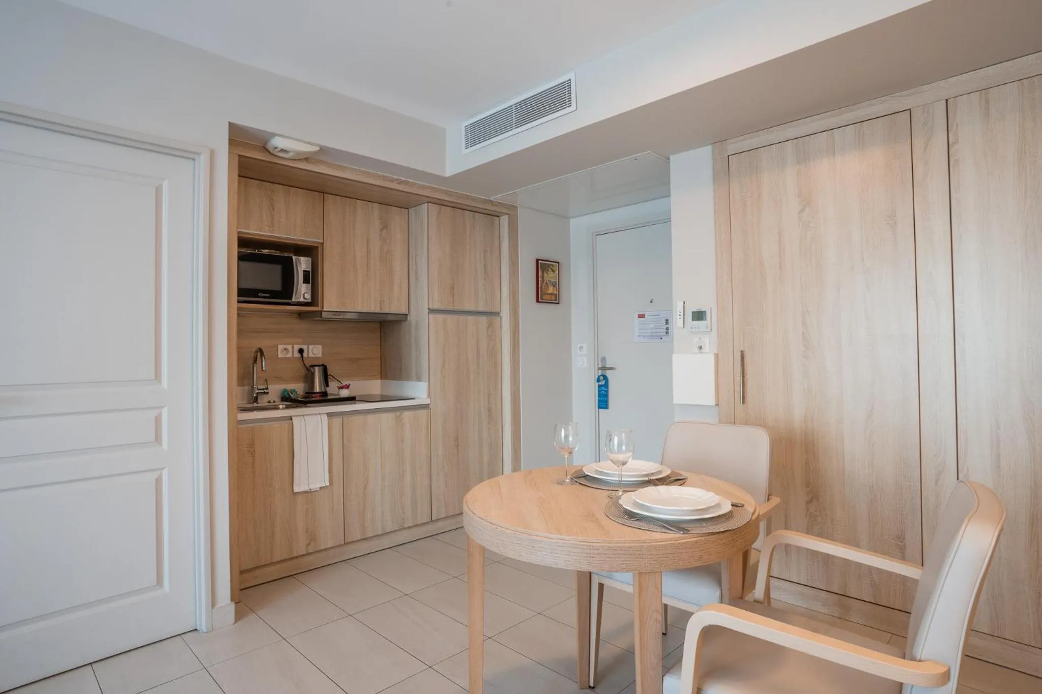 Kitchen or kitchenette in Zenitude Quality Aparthotel Nice