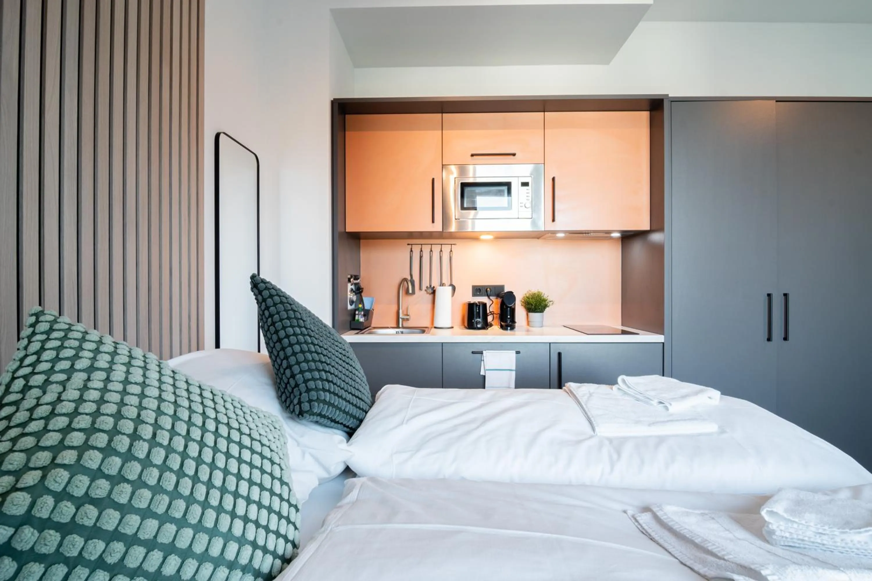 Bed in Homaris Apartments Winterhude