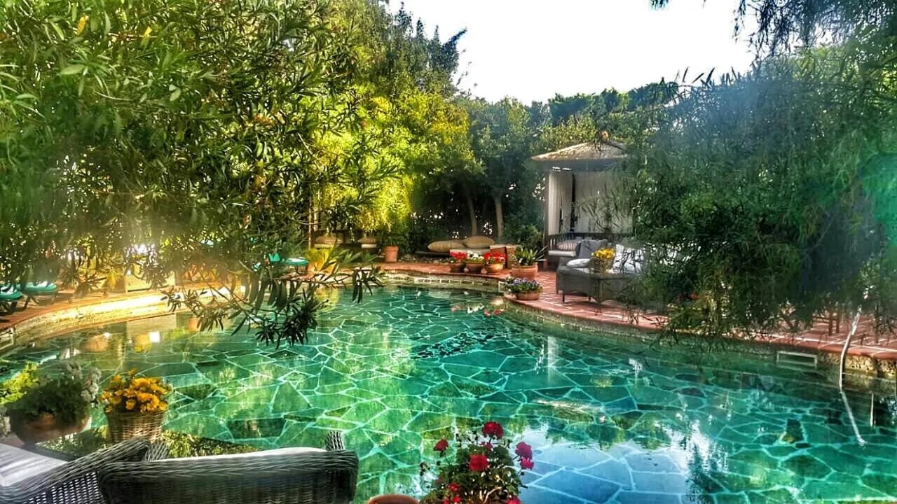 Swimming pool in El Vino Hotel & Suites