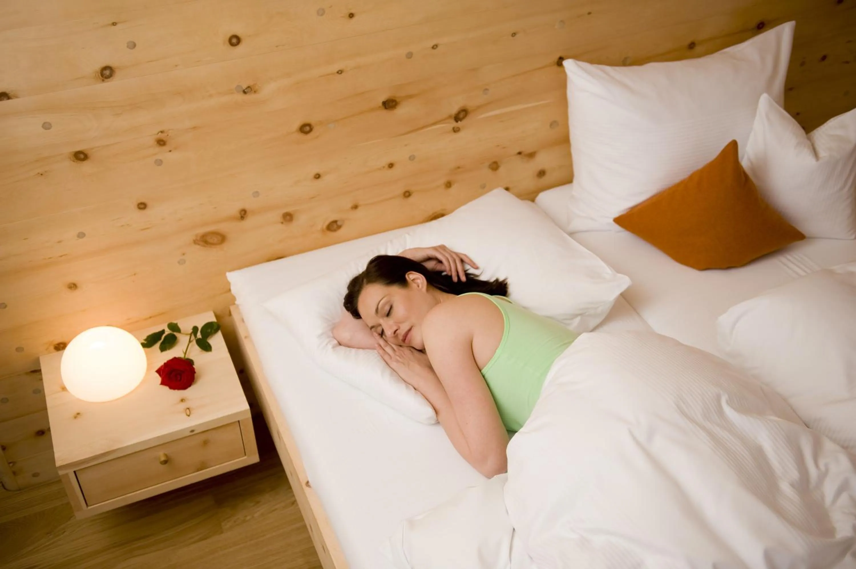 Bed in Biohotel Mattlihüs