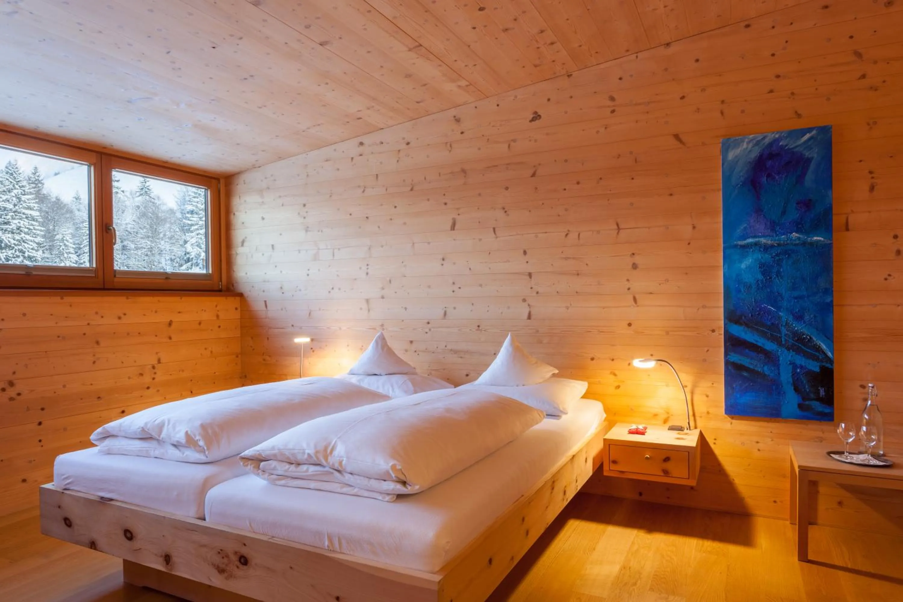 Bed in Biohotel Mattlihüs