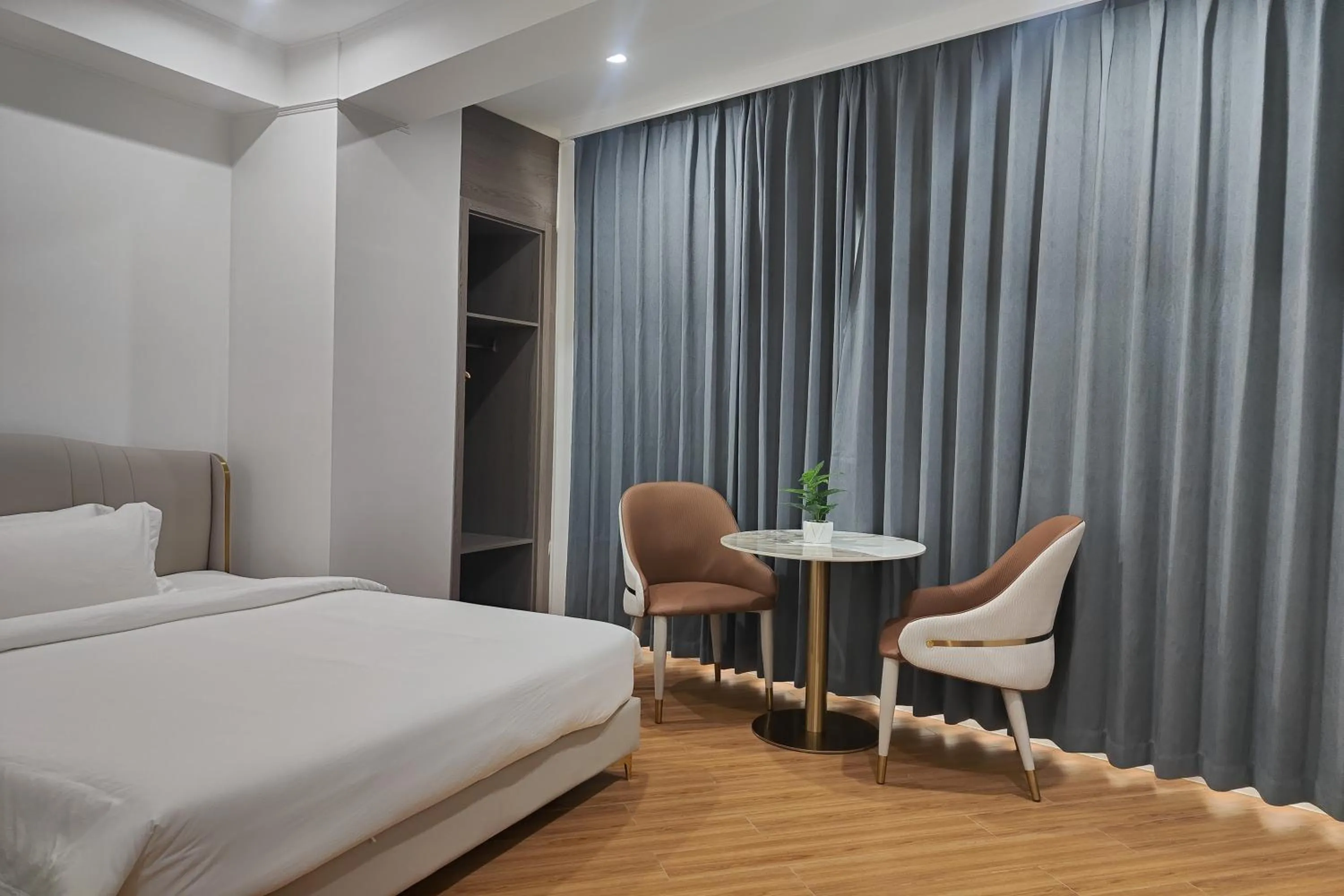 Bed in Mactan Grand Golden Hotel near Airport