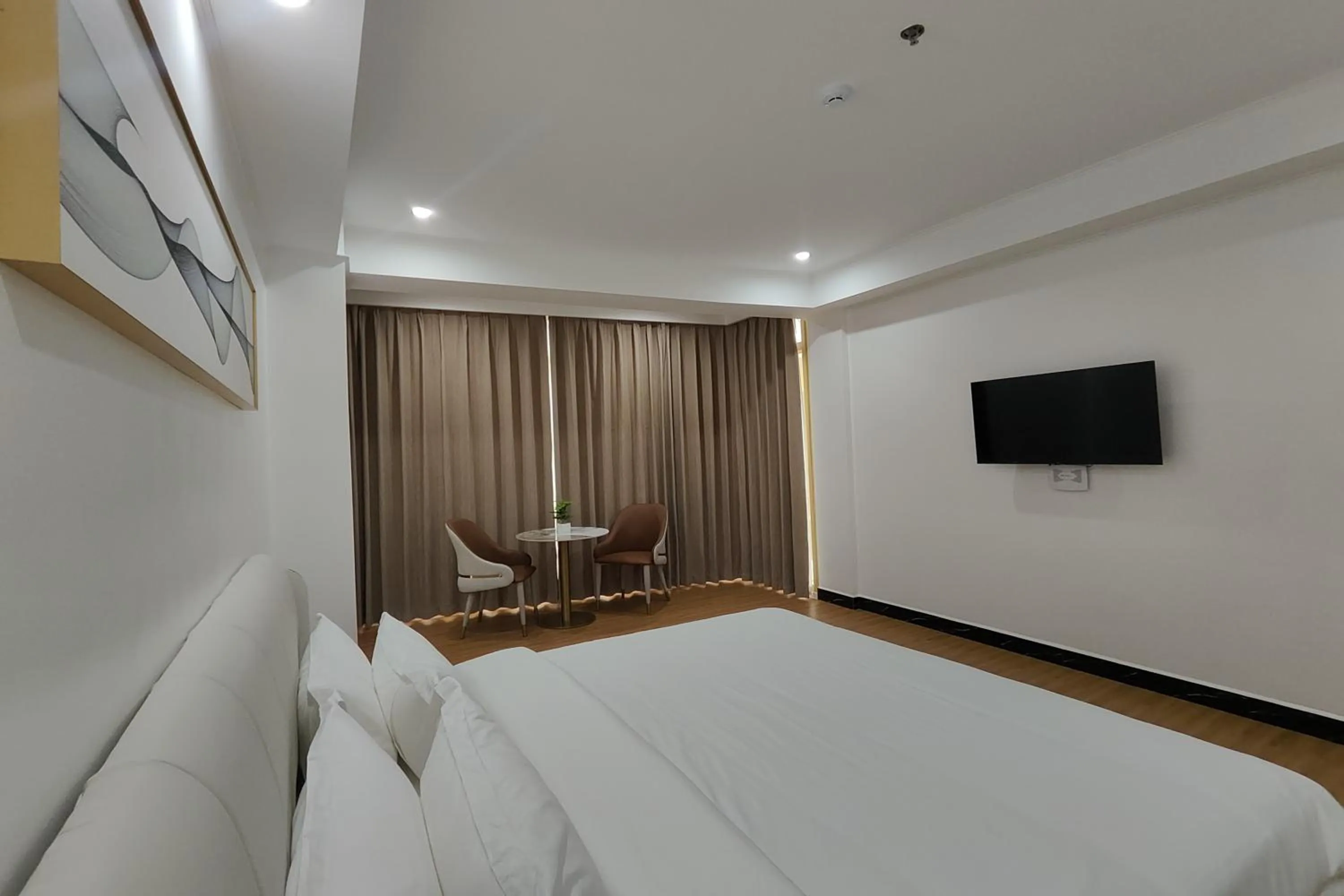 Bed in Mactan Grand Golden Hotel near Airport