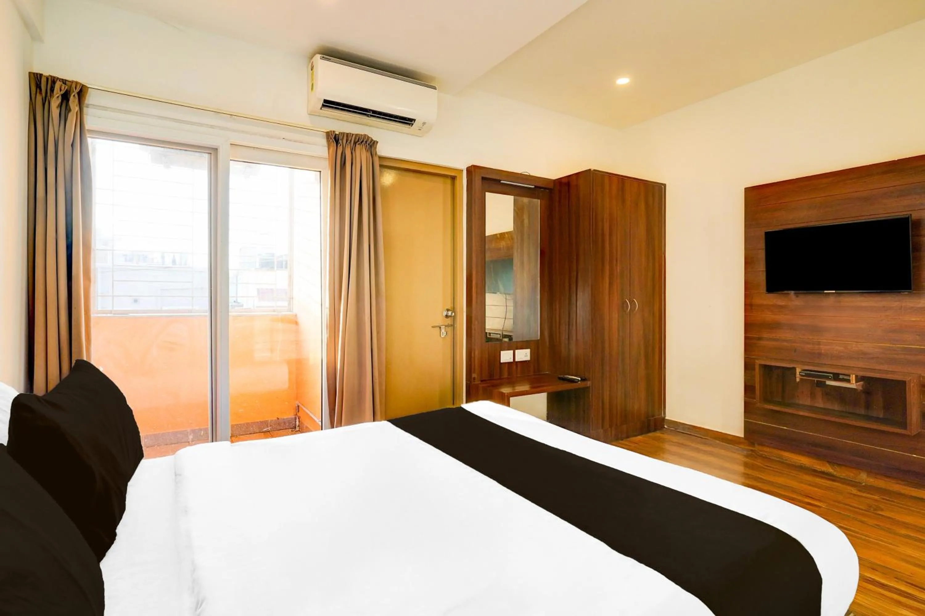 Bedroom, Bed in Super Townhouse Whitefield Bangalore