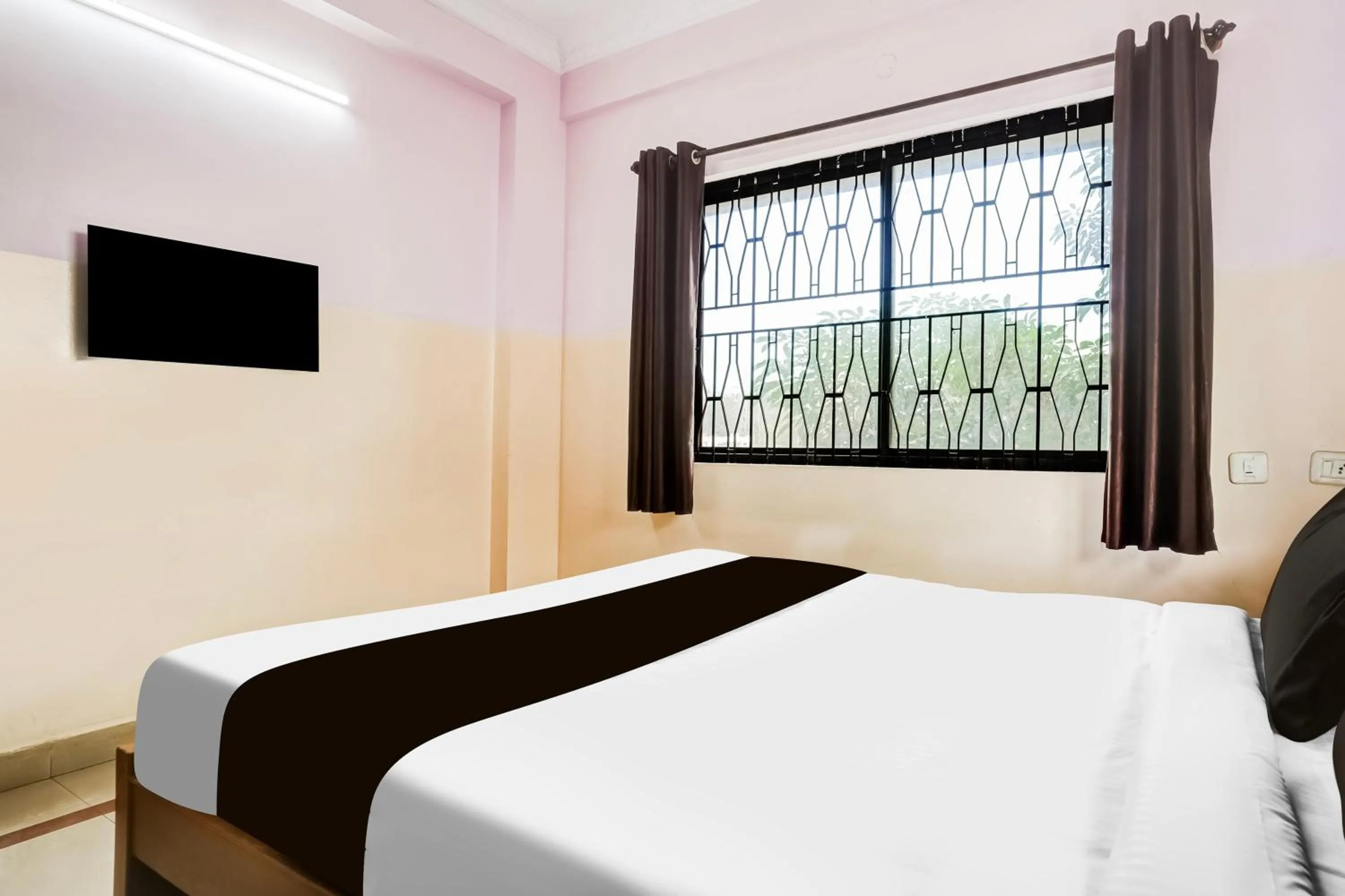 Bedroom in Super Collection O Yeshwantpur Formerly Sunder Nivas