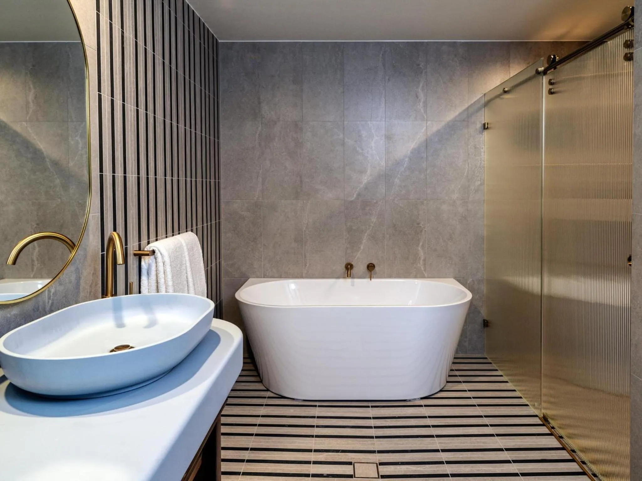 Bathroom in voco Gosford by IHG