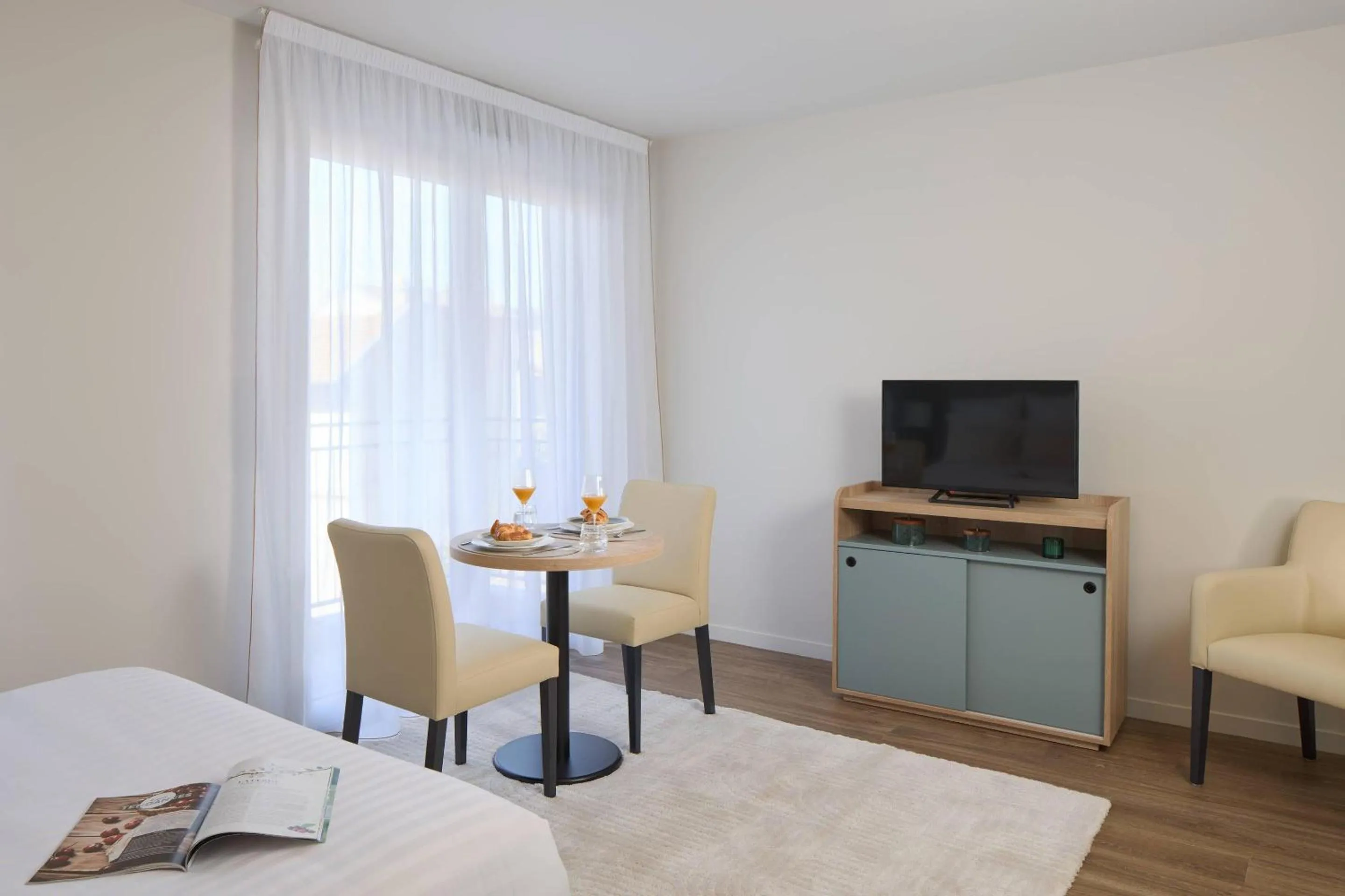 Bedroom in Zenitude Quality Aparthotel Nancy Centre