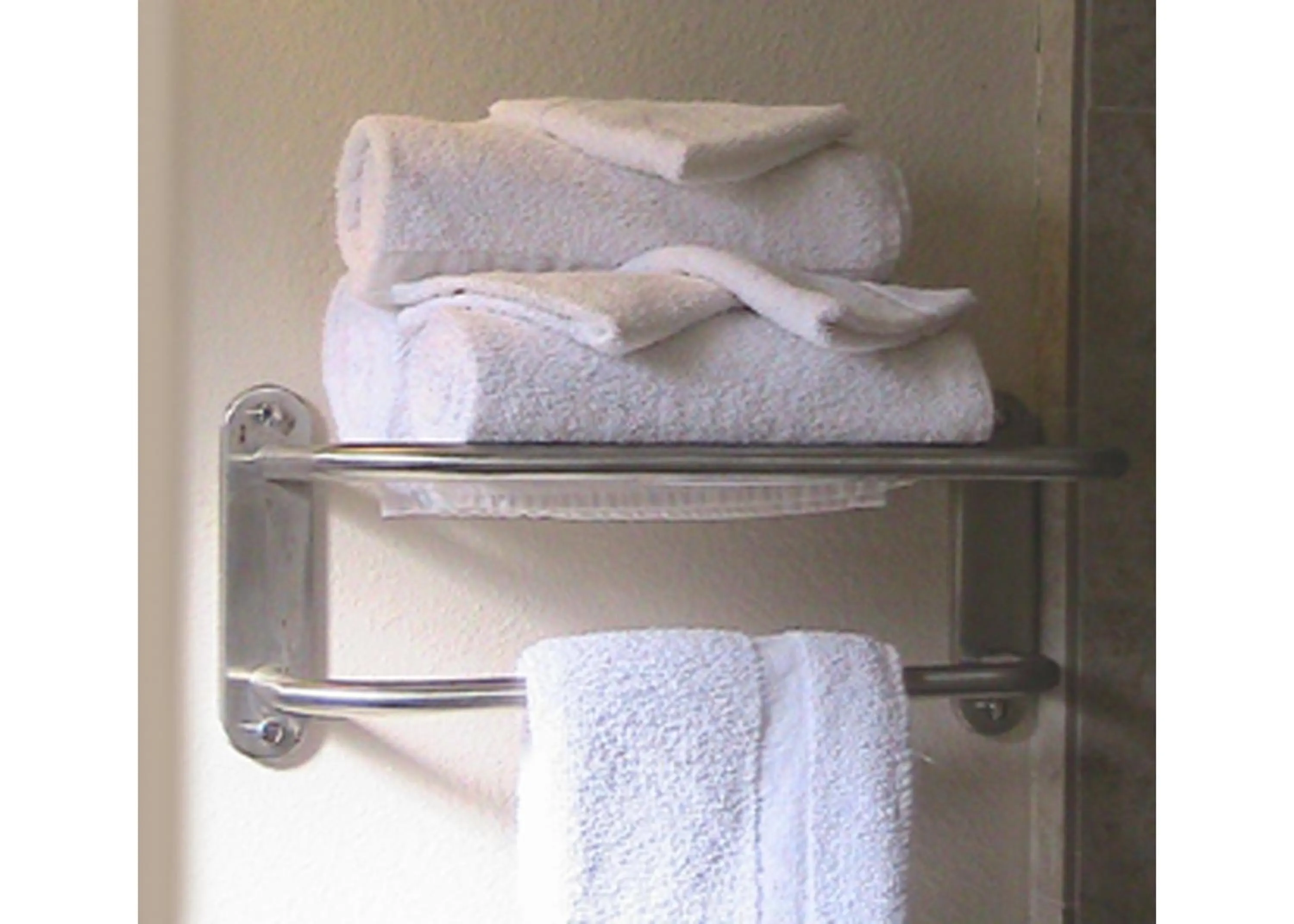 Bathroom, Bed in At Home Express Tangerine Inn