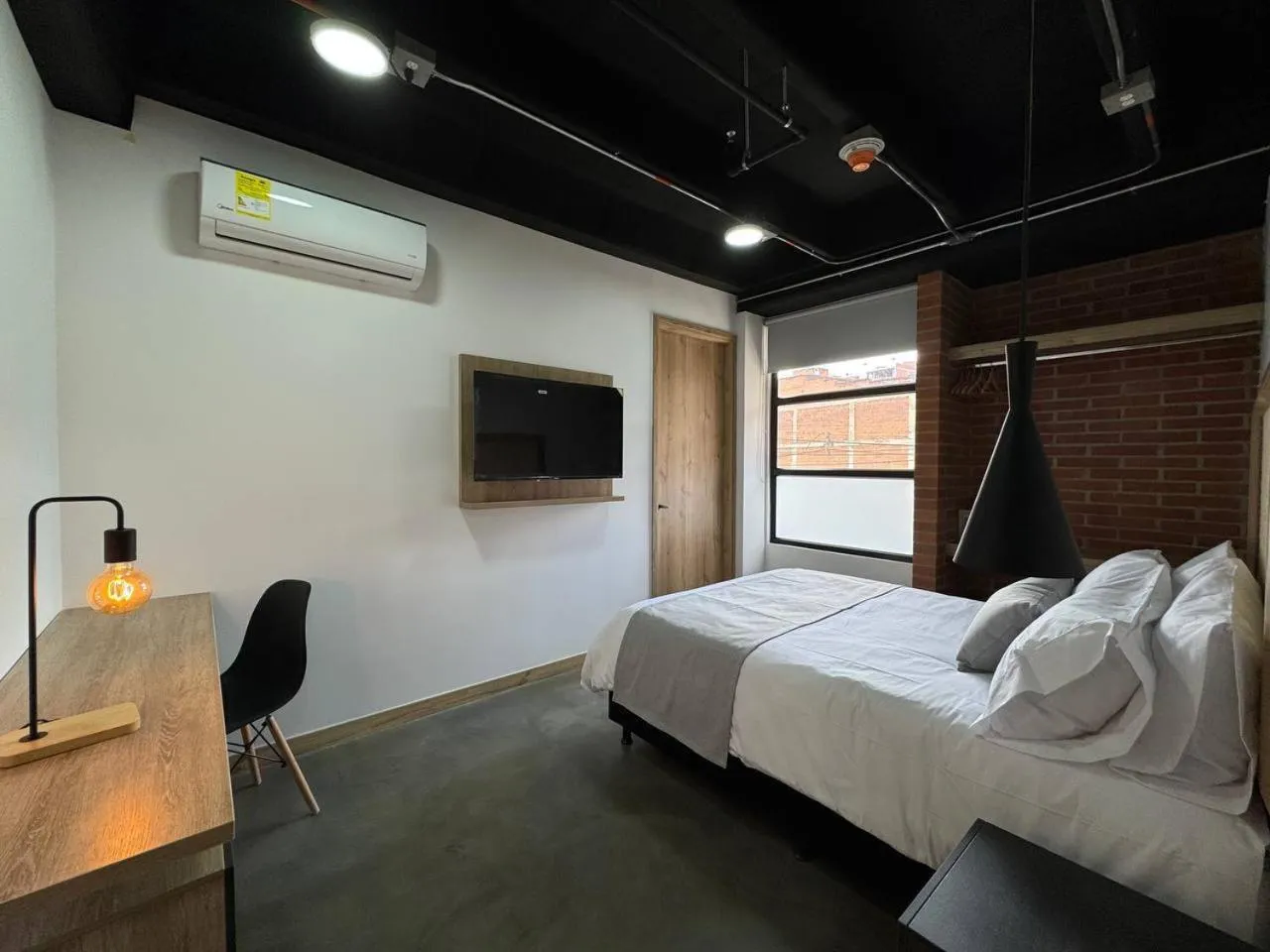 Bed in Akela Park Hotel