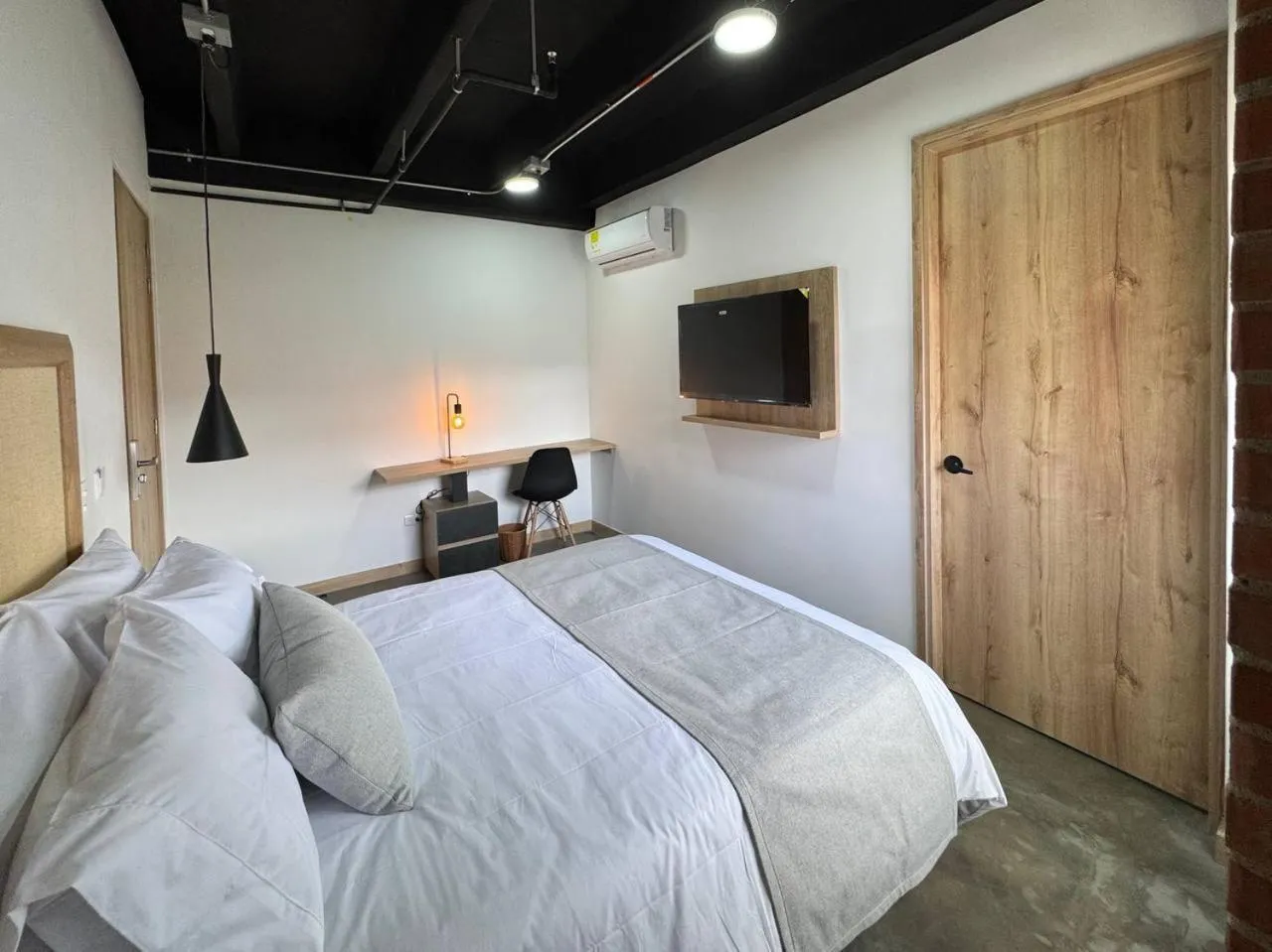 Bed in Akela Park Hotel