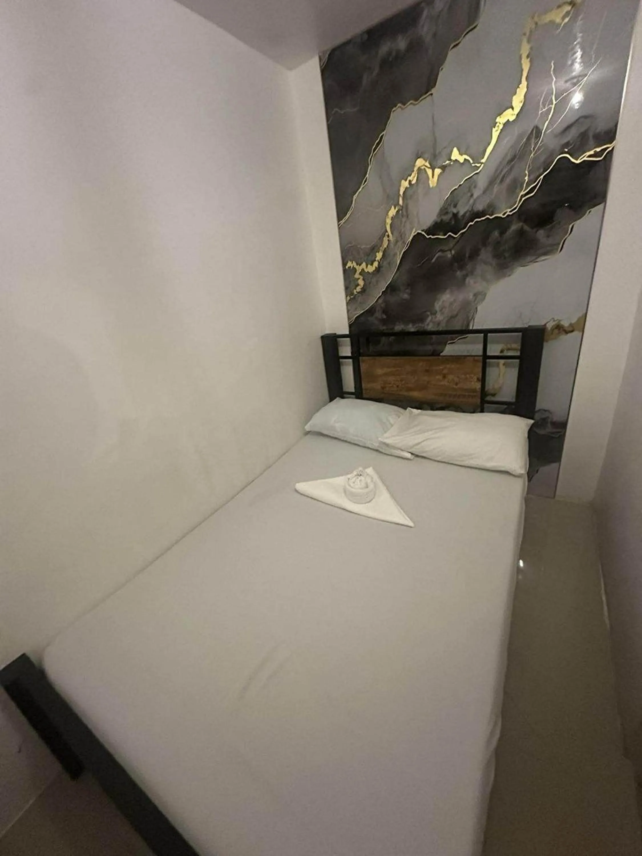 Bed in Hotel Villarte Fort Pampanga