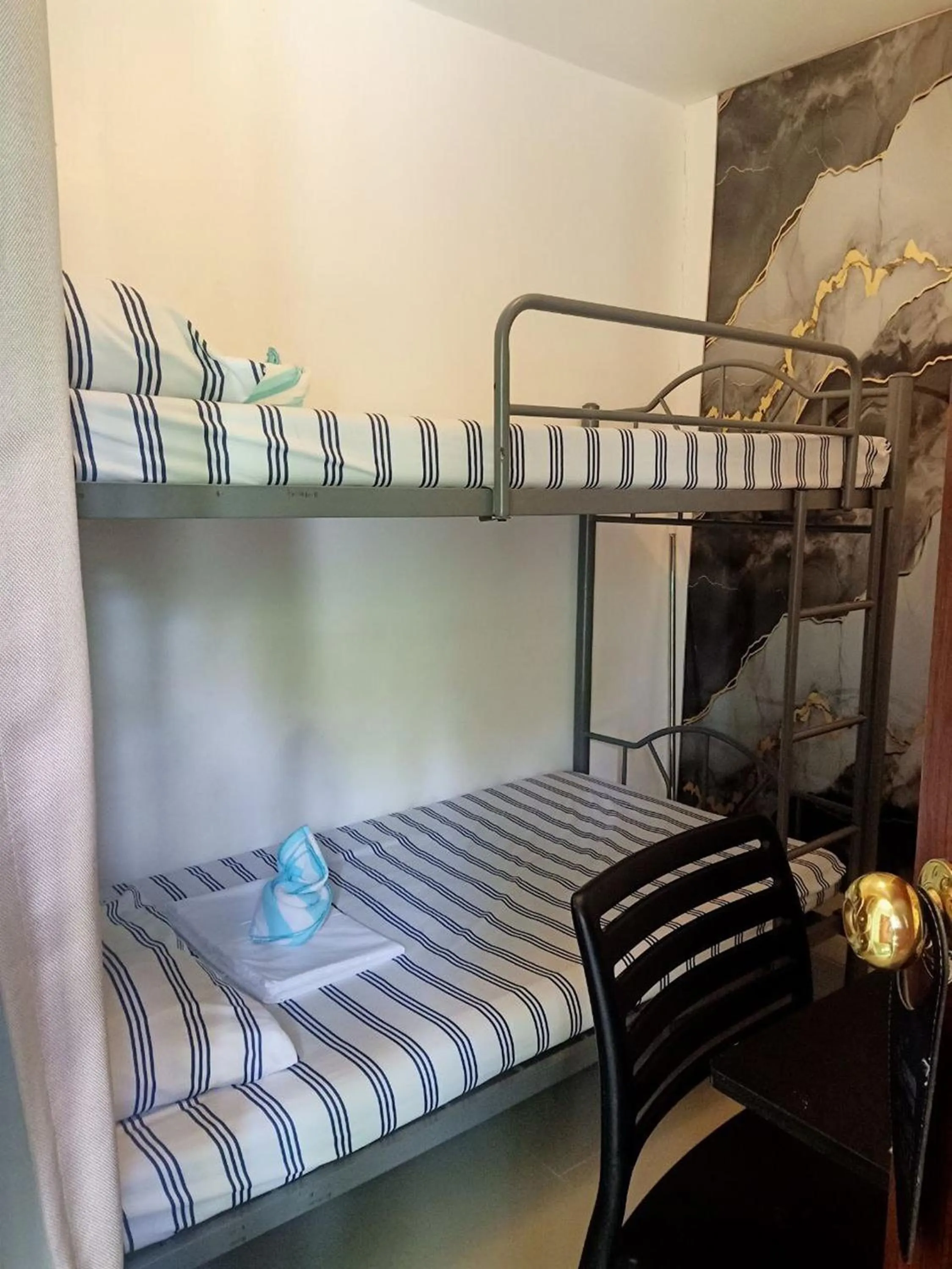 Bed in Hotel Villarte Fort Pampanga