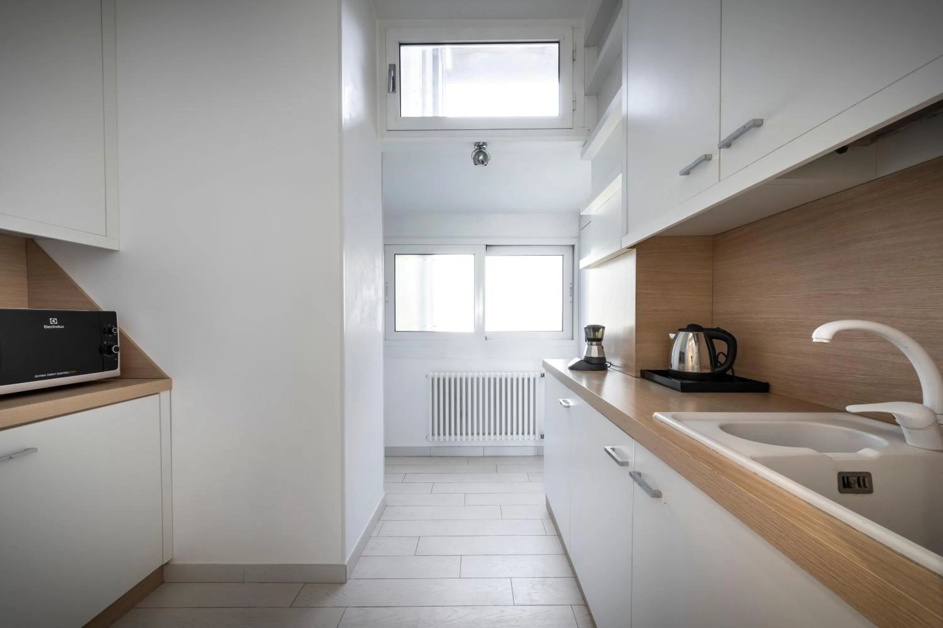 Kitchen or kitchenette in LHP Suite Roma Piazza del Popolo