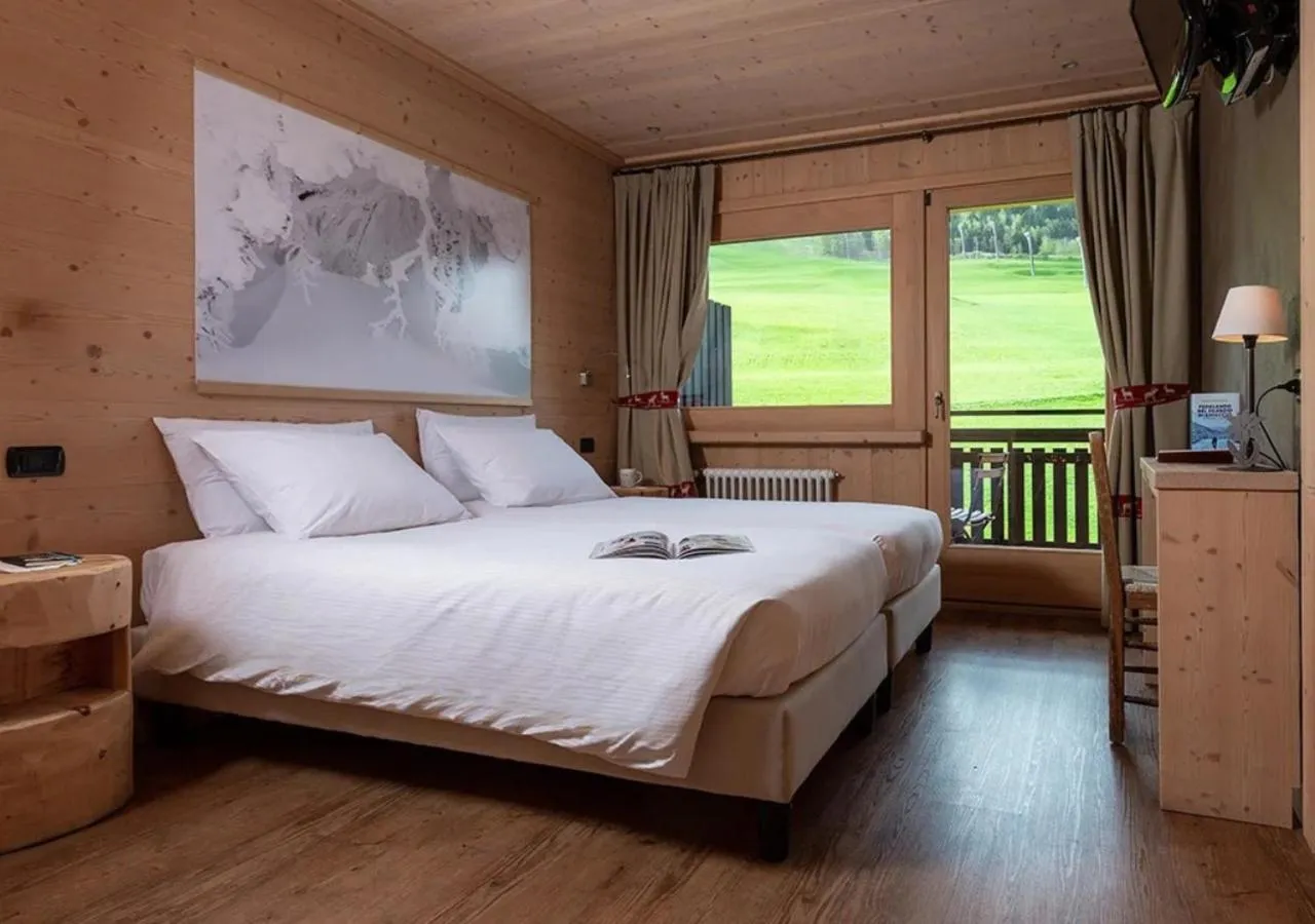 Photo of the whole room, Bed in Funivia Bormio Active Hotel - Adults Only