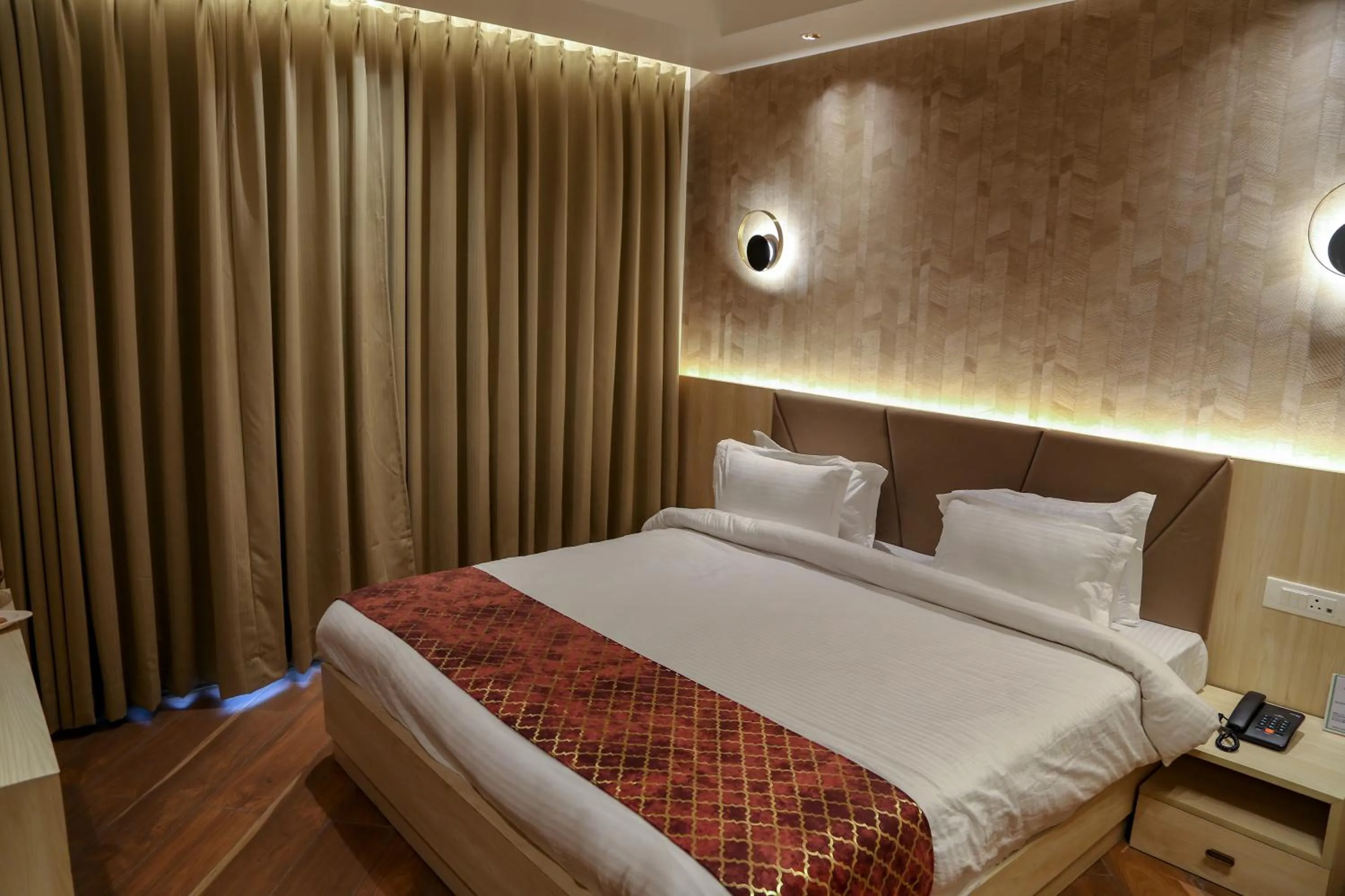 Bed in Four Leaf Hotel Arjuna Manor, Varanasi