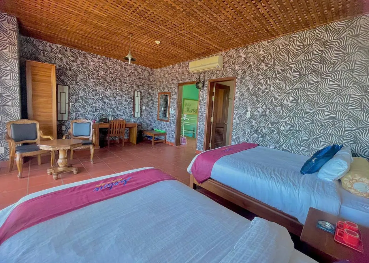 Bed in Melon Resort & Pickleball Club Mũi Né