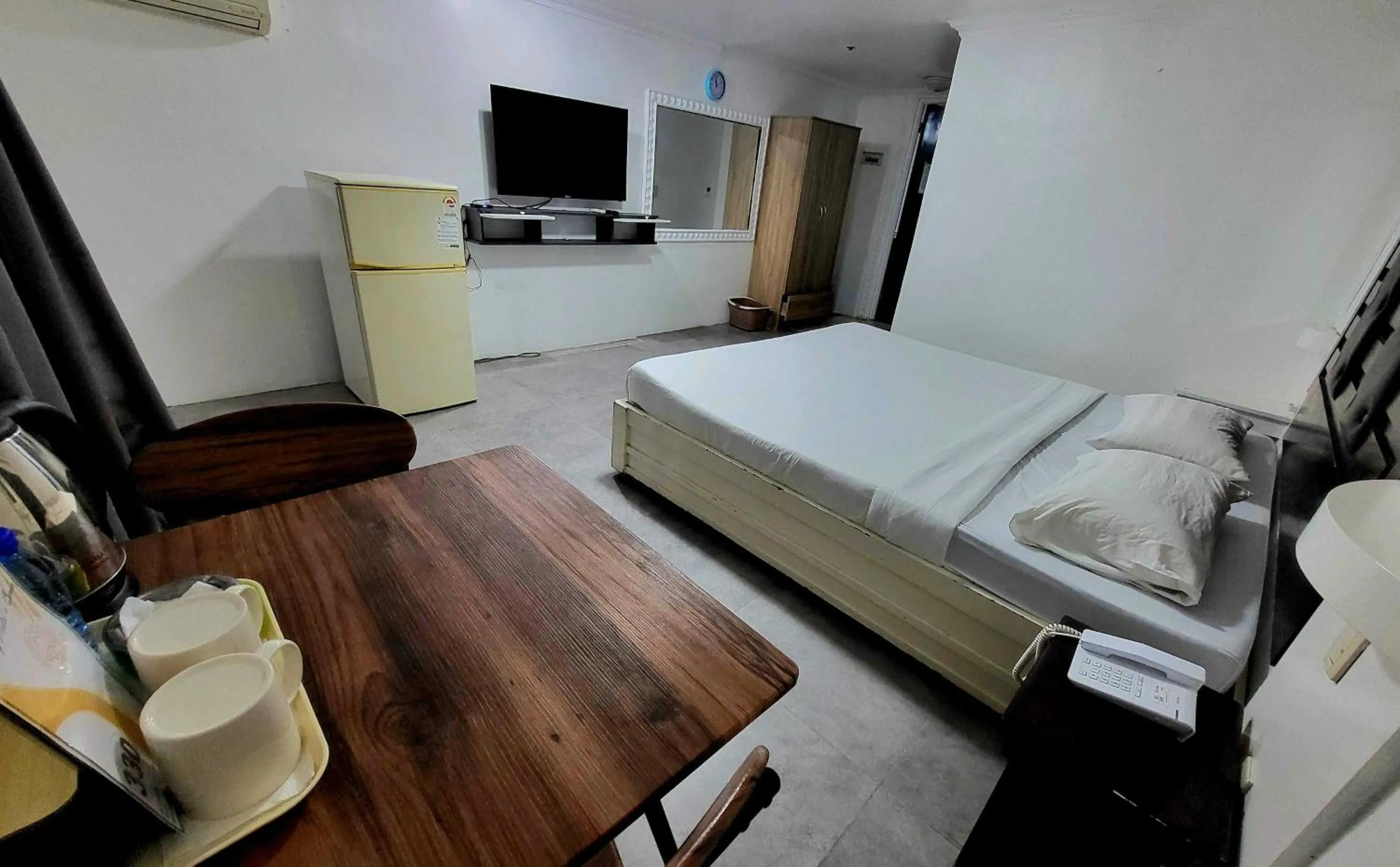 Bed in OYO 1141 Healing Condo Hotel