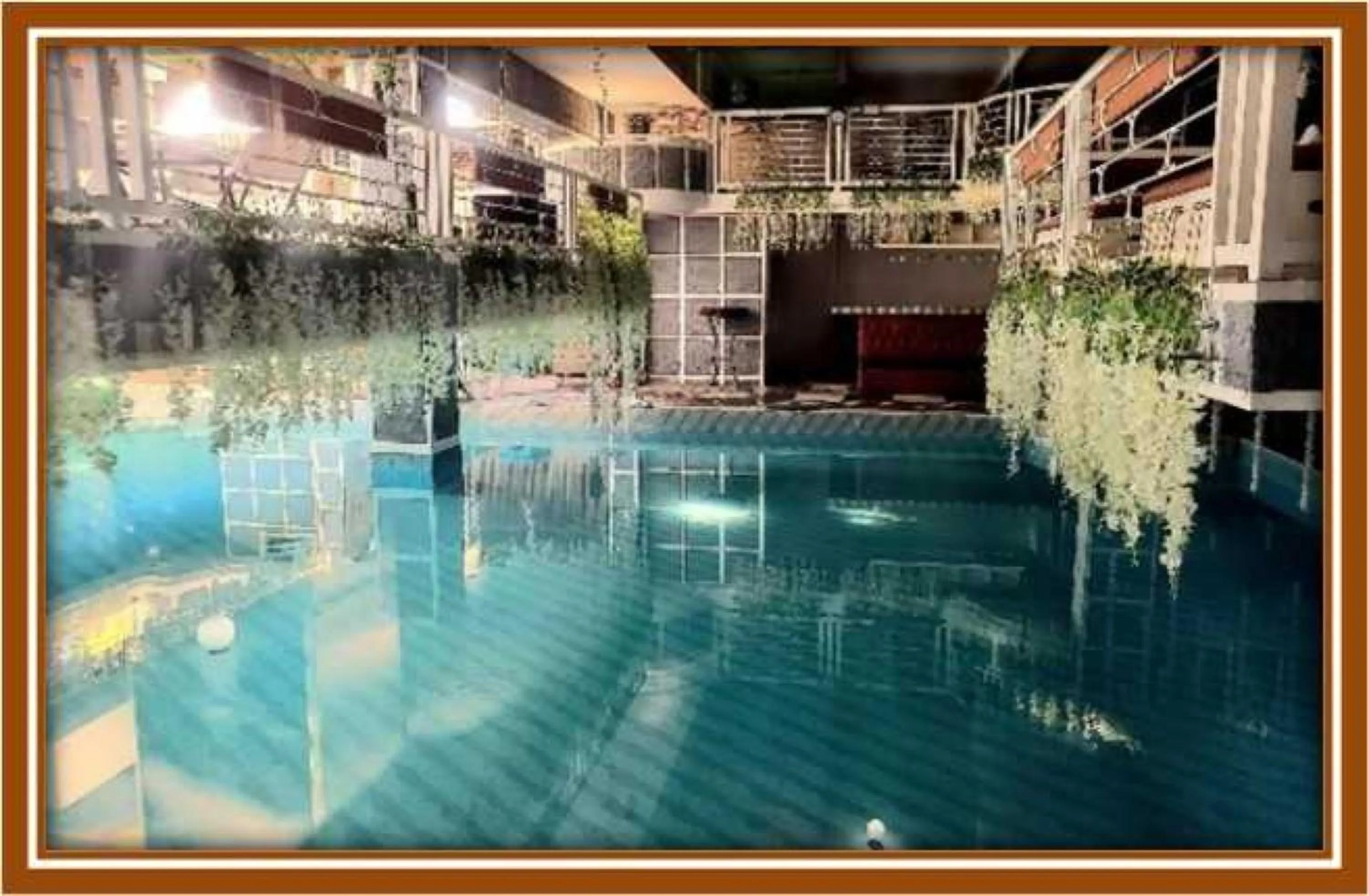 Swimming pool in OYO 1141 Healing Condo Hotel