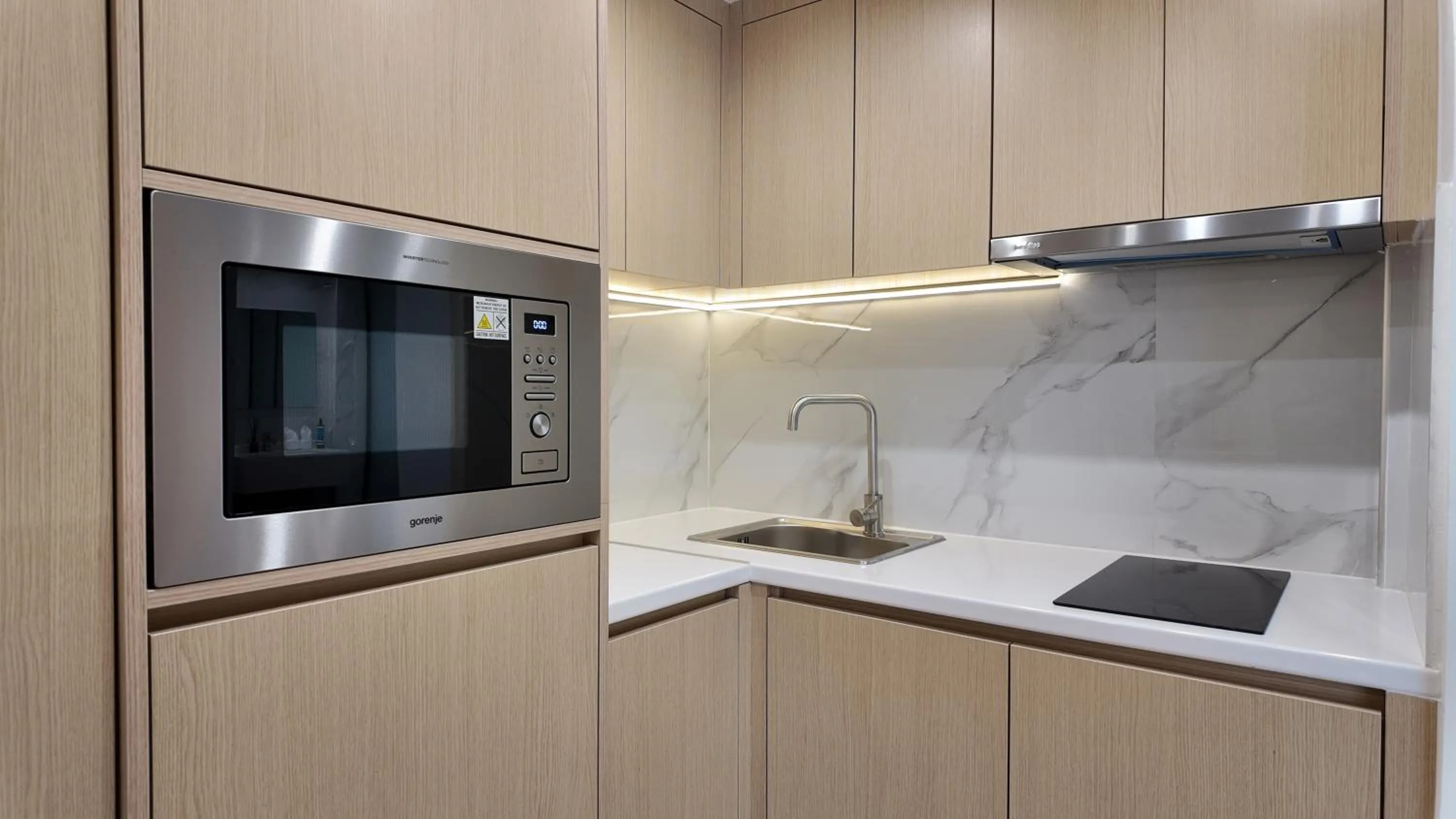 Kitchen or kitchenette in CC LUX Suites in Piraeus Port
