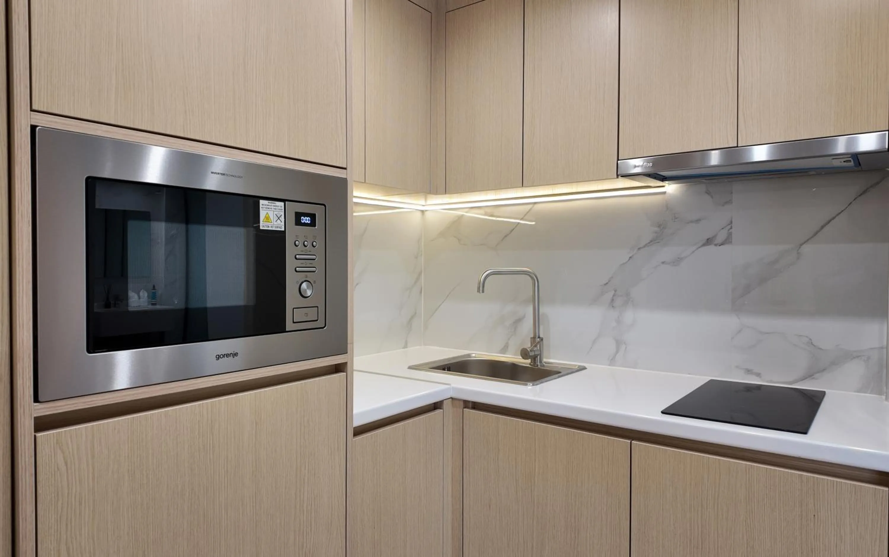 Kitchen or kitchenette in CC LUX Suites in Piraeus Port