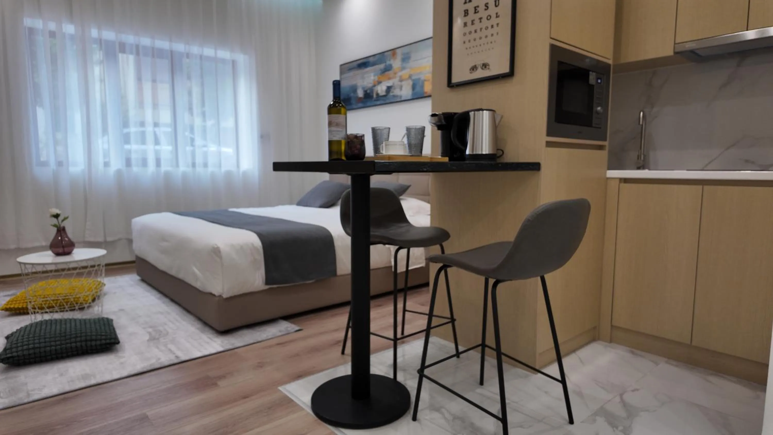 Dining area, Bed in CC LUX Suites in Piraeus Port